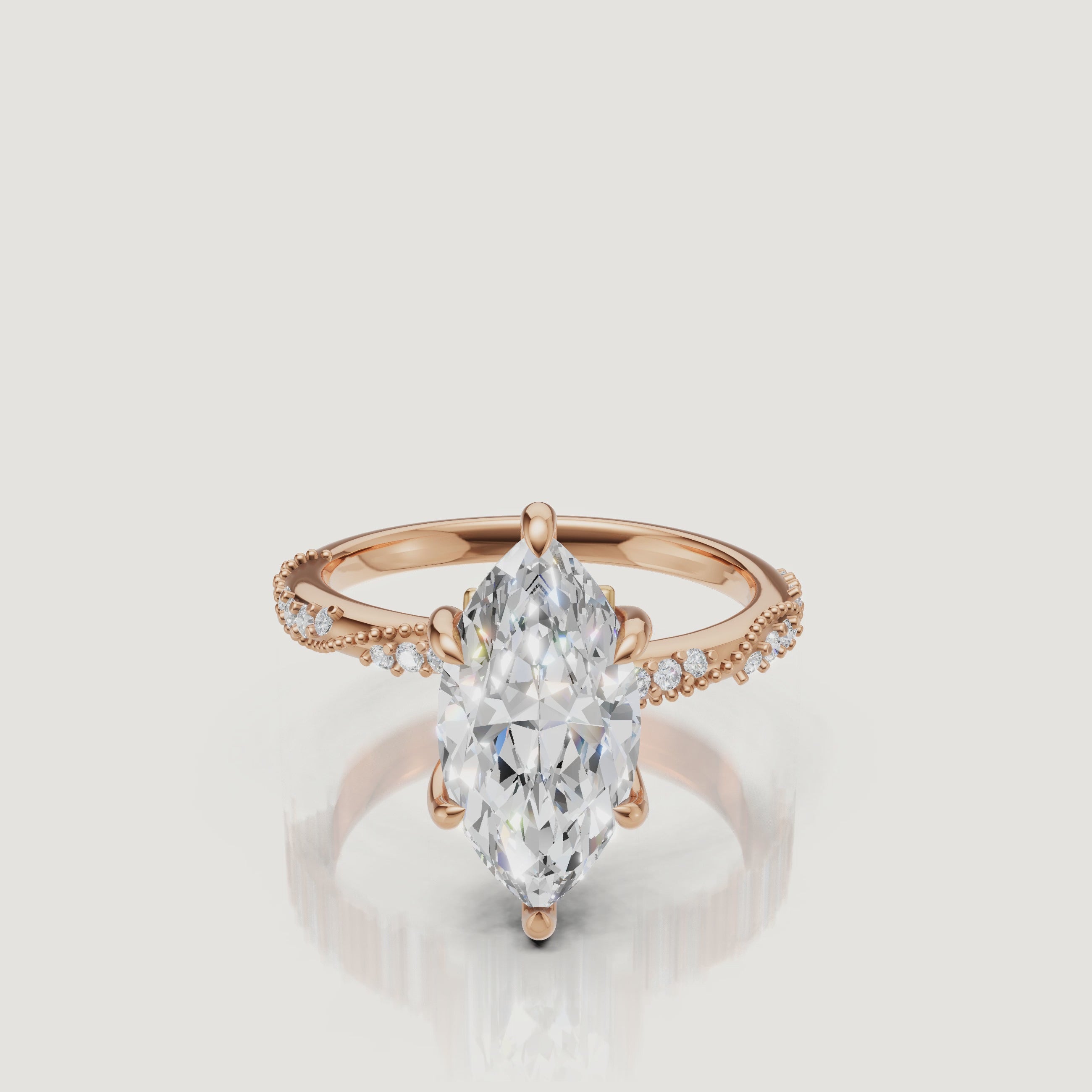 14K yellow gold marquise cut lab grown diamond engagement ring with twisted pavé band and elongated sparkle by Raul Diamonds