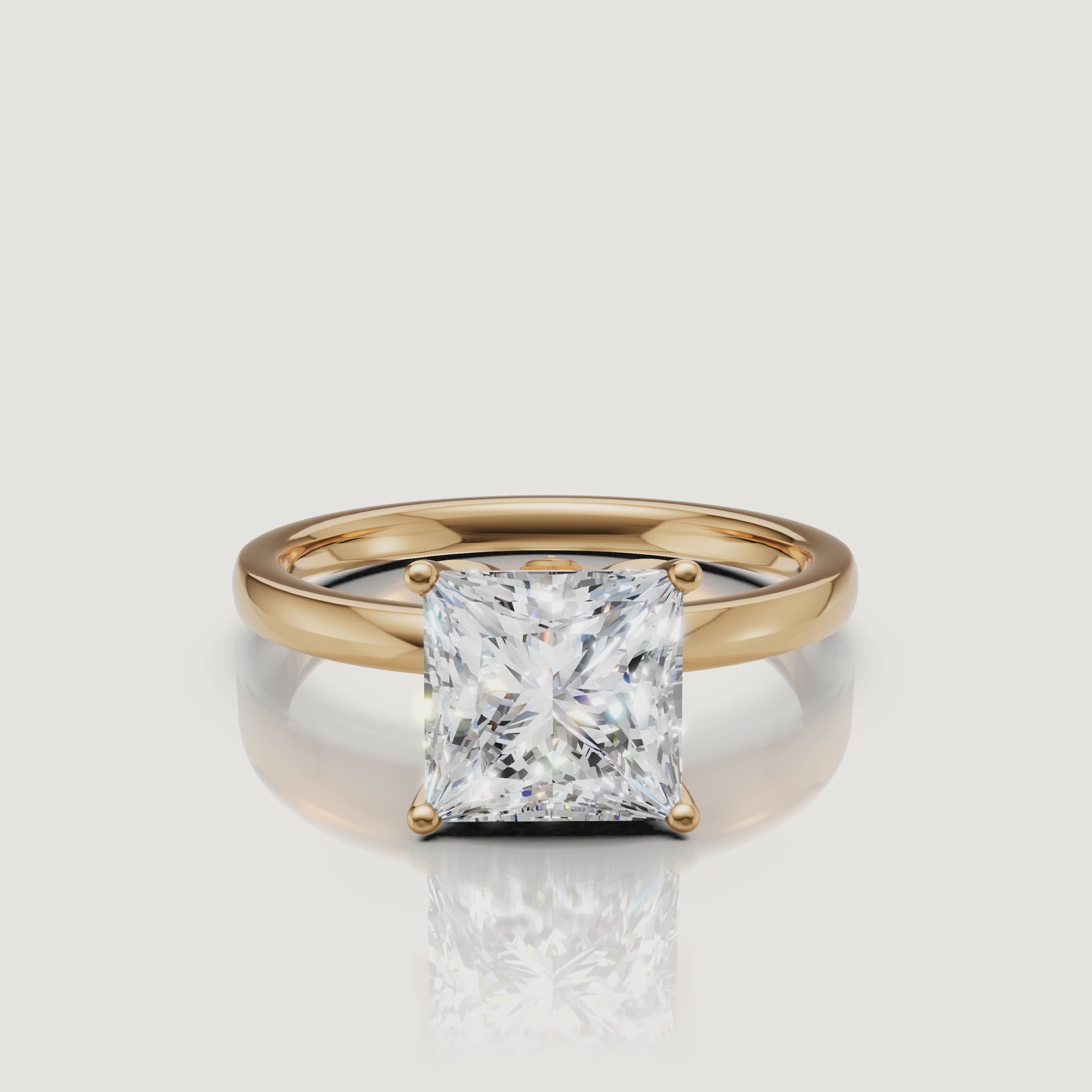 High-definition product video of a Raul Diamonds princess cut solitaire ring in yellow gold, showcasing the intense sparkle and classic architectural setting