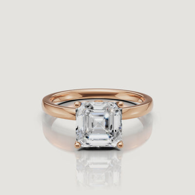 360-degree product video of a rose gold Asscher cut solitaire ring by Raul Diamonds, highlighting the warm blush tones of the metal against the colorless diamond brilliance