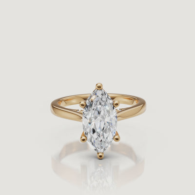HD cinematic video showing the light performance of a Raul Diamonds marquise cut engagement ring in 18k yellow gold