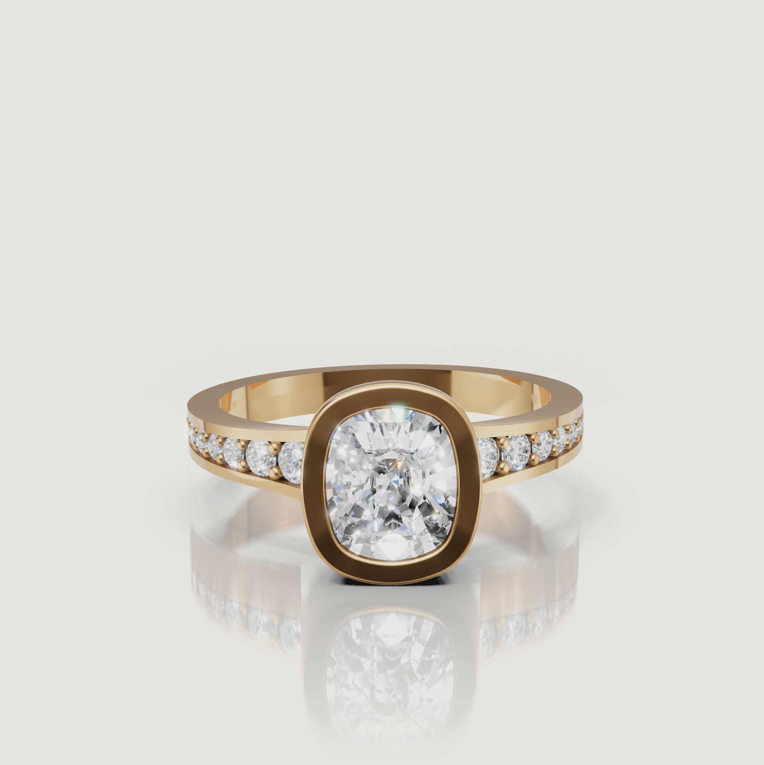 360 video of the Seo yellow gold bezel cushion diamond engagement ring with pavé band by Raul Diamonds.