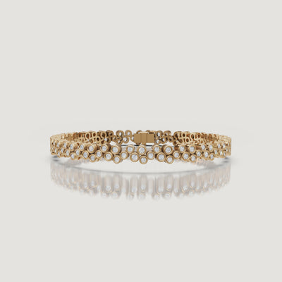 Cinematic yellow gold bezel diamond bracelet video by Raul Diamonds showcasing sparkling lab grown diamonds, graceful wrist movement, luxury close-up details, and timeless fine jewelry elegance