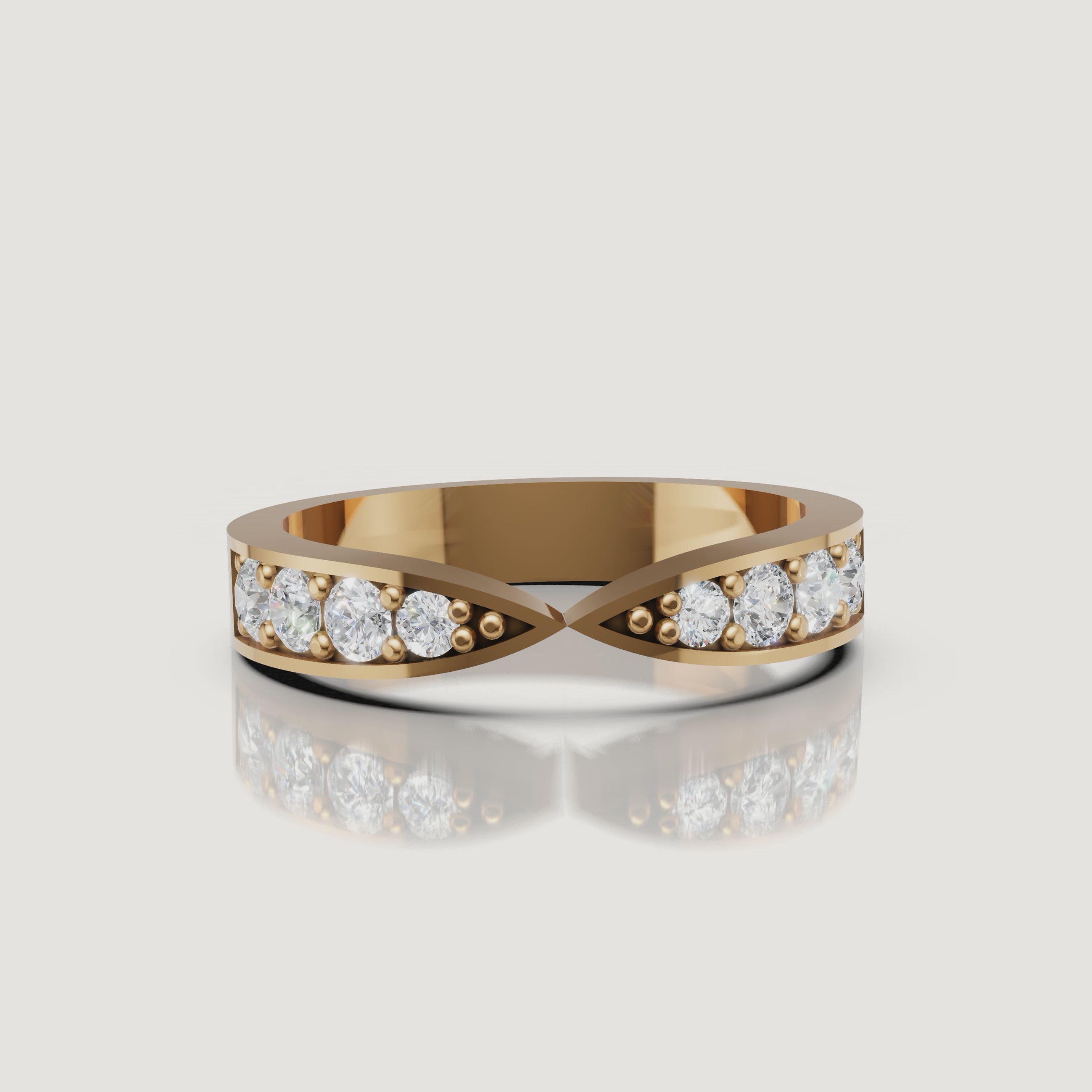 Yellow gold infinity crossover diamond wedding band video by Raul Diamonds with sparkling round diamonds