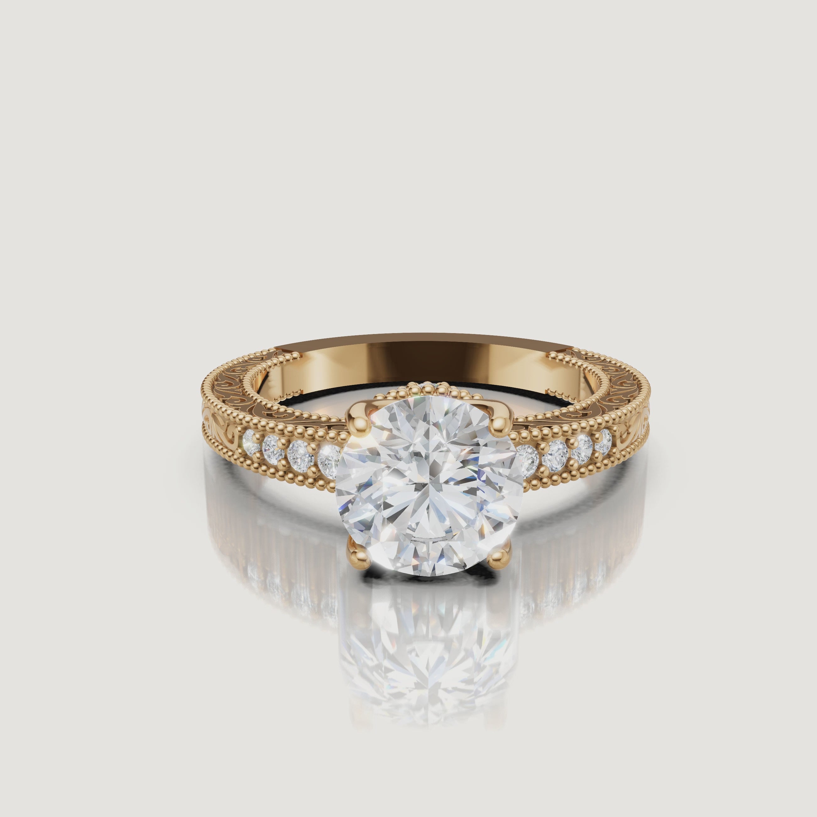 360 video of vintage round cut lab grown diamond engagement ring in 14K yellow gold with intricate milgrain detailing by Raul Diamonds.