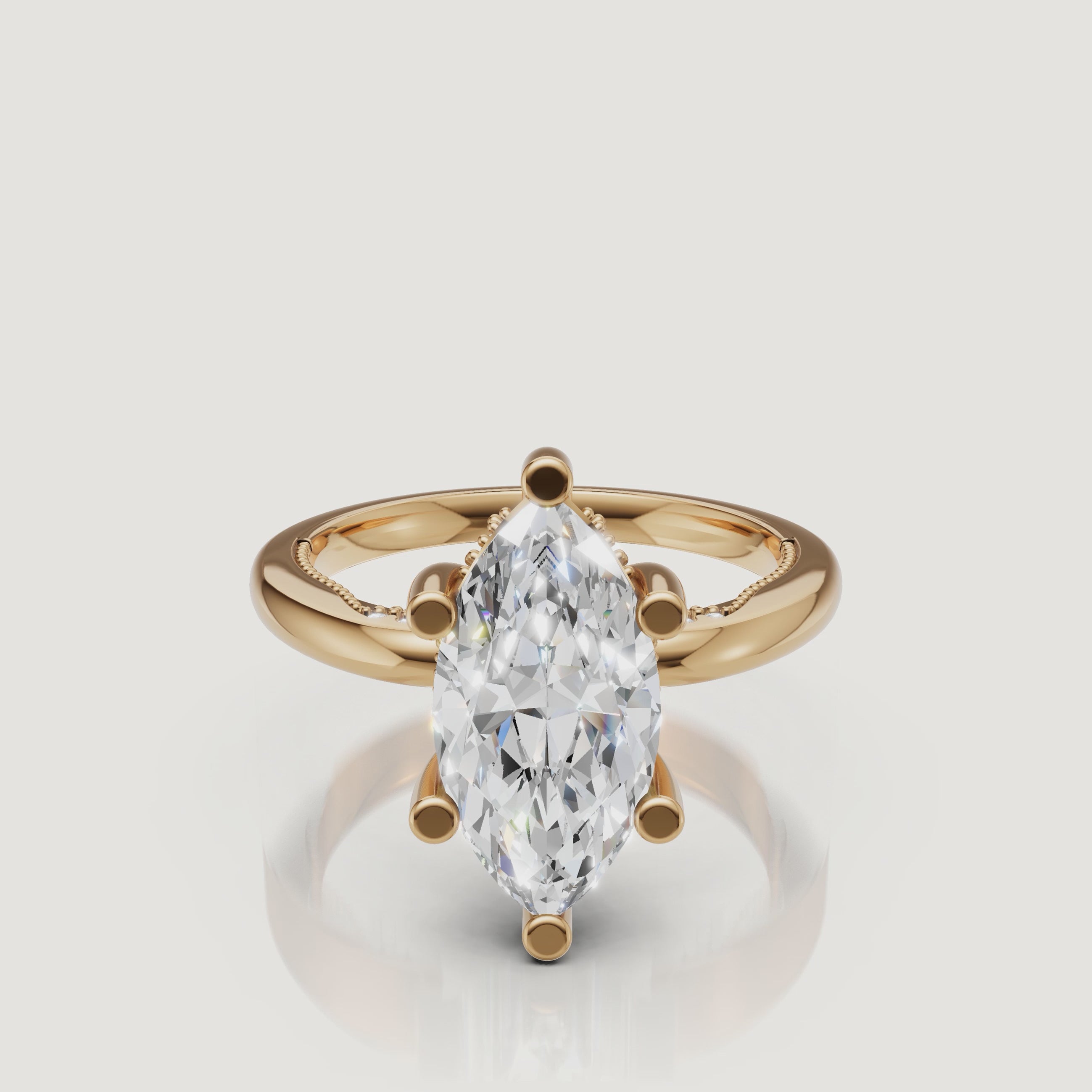 Cinematic video of a Raul Diamonds marquise cut ring in yellow gold, showcasing the brilliance of the pointed ends and the warm 18k gold glow