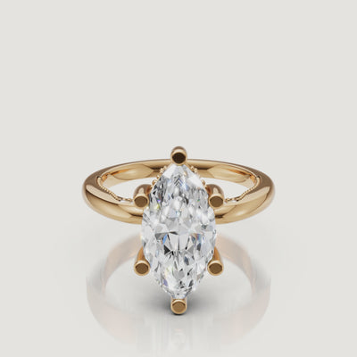 Cinematic video of a Raul Diamonds marquise cut ring in yellow gold, showcasing the brilliance of the pointed ends and the warm 18k gold glow