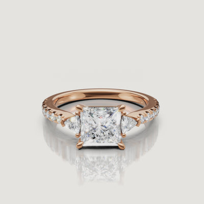Cinematic video showcase of a Rual Diamonds princess-cut diamond engagement ring, capturing the intense light return and the sparkle of the diamond-encrusted pavé band