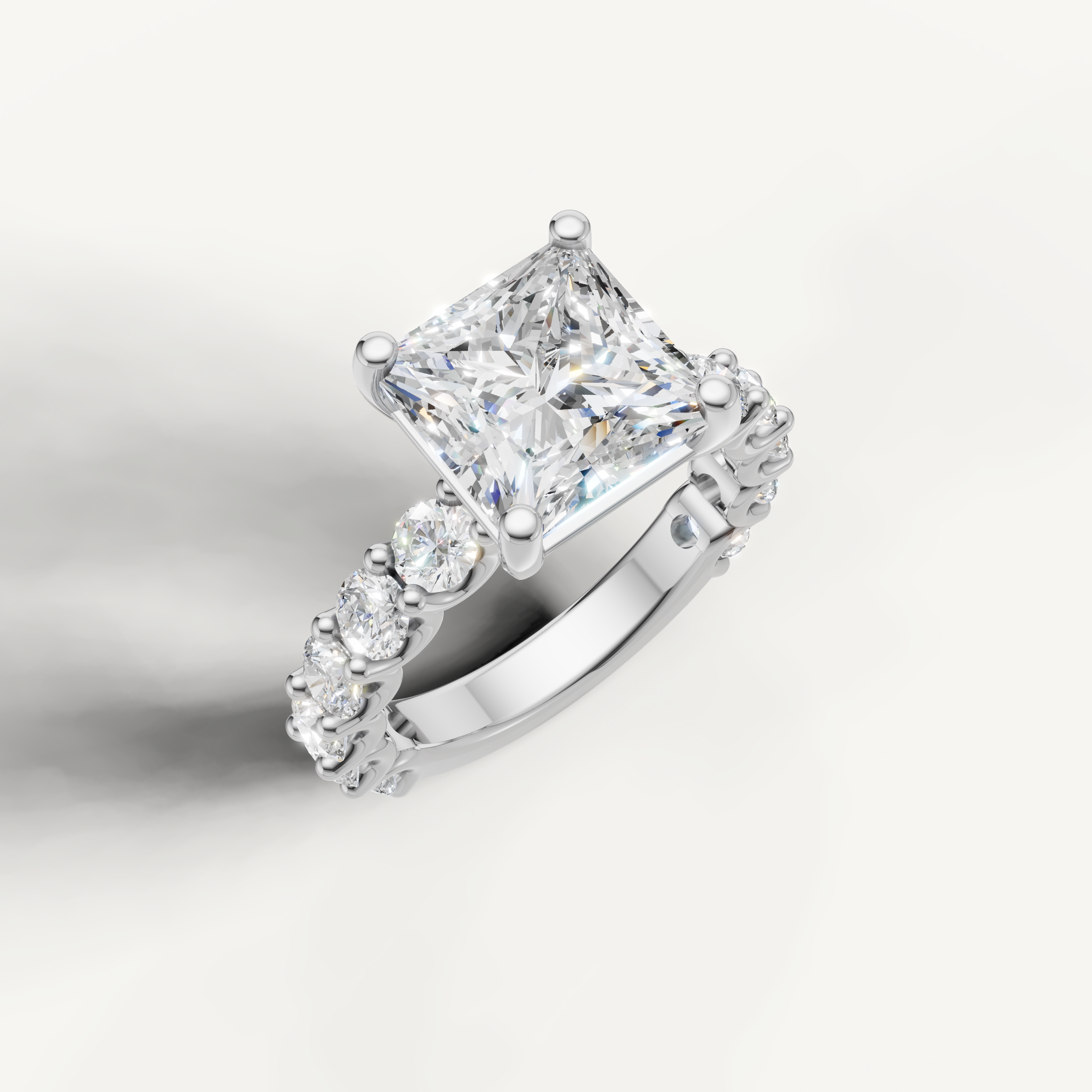 IGI certified princess cut lab diamond ring with round side diamonds shared prong band white gold