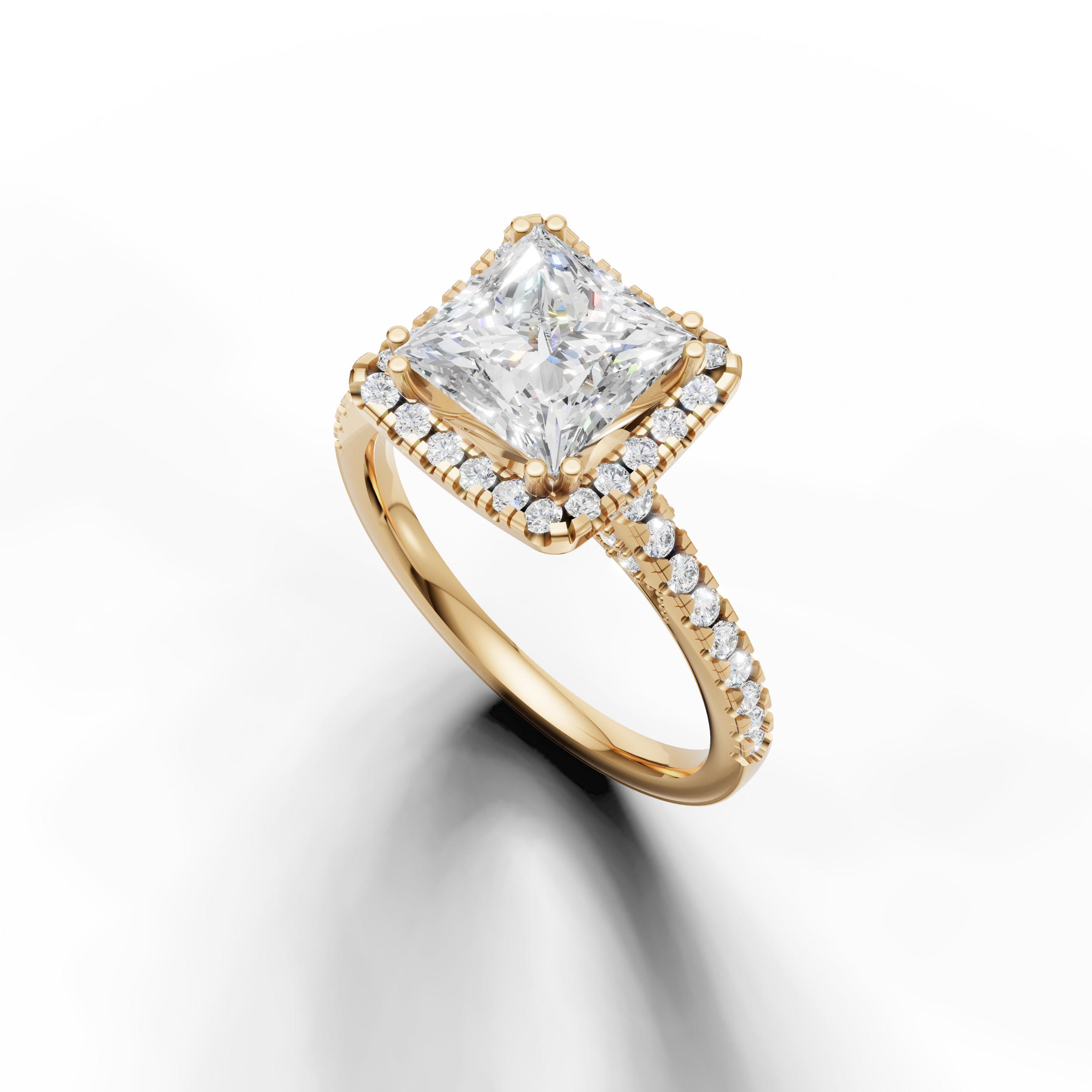 Yellow gold princess cut lab grown diamond ring featuring a classic halo setting and delicate pavé band