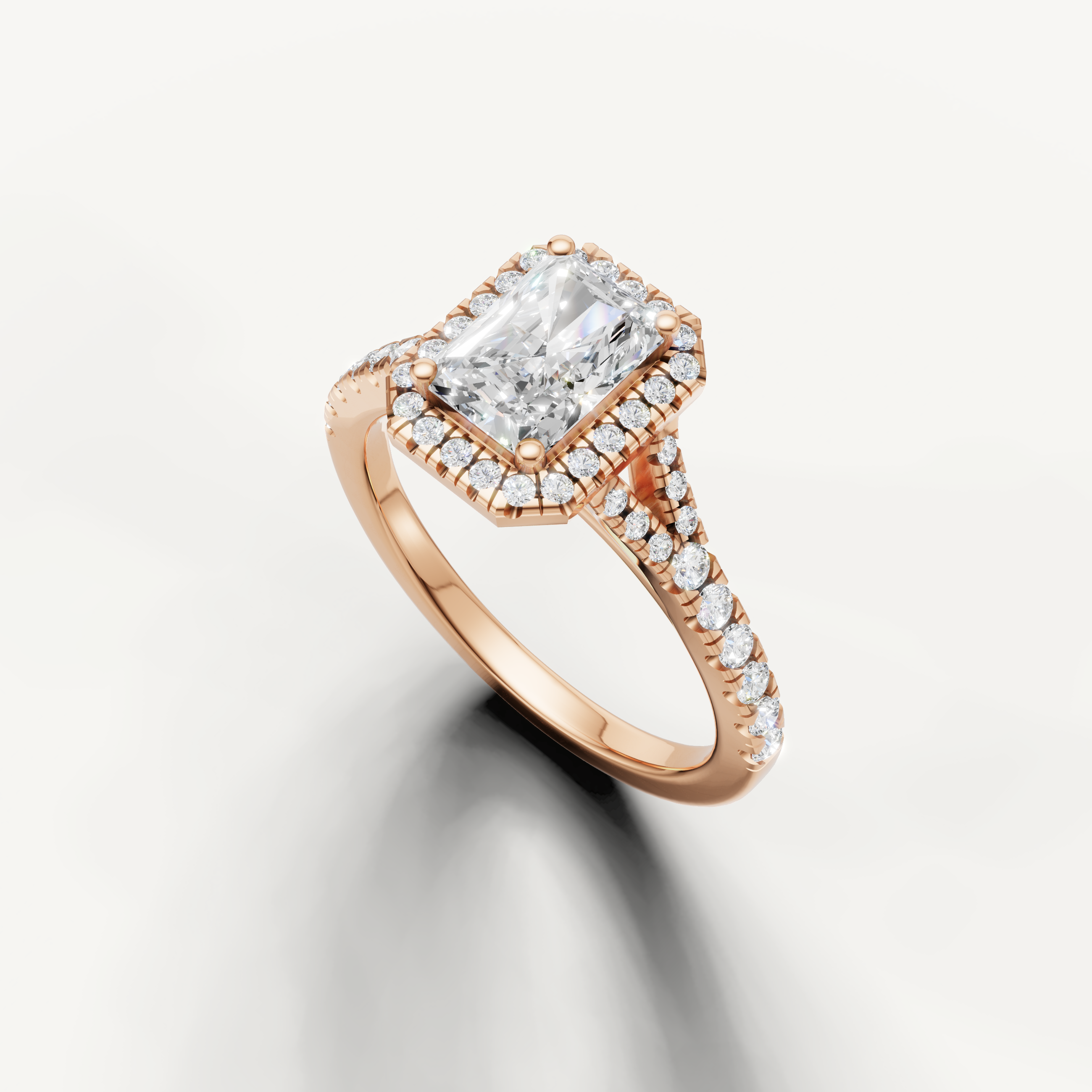 Vintage style radiant diamond halo ring with pavé band rose gold