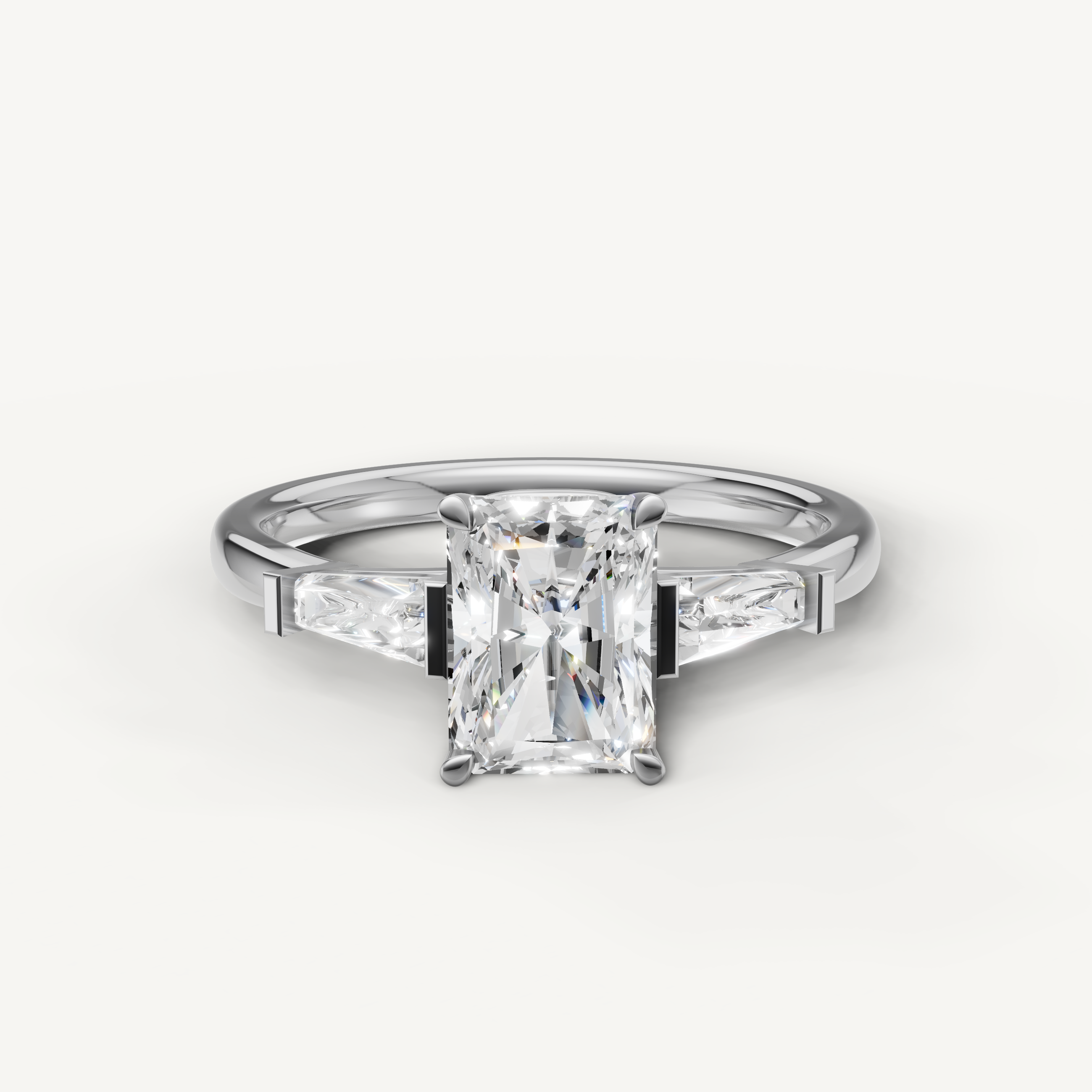 Radiant cut lab grown diamond ring with tapered baguette side stones white gold engagement ring