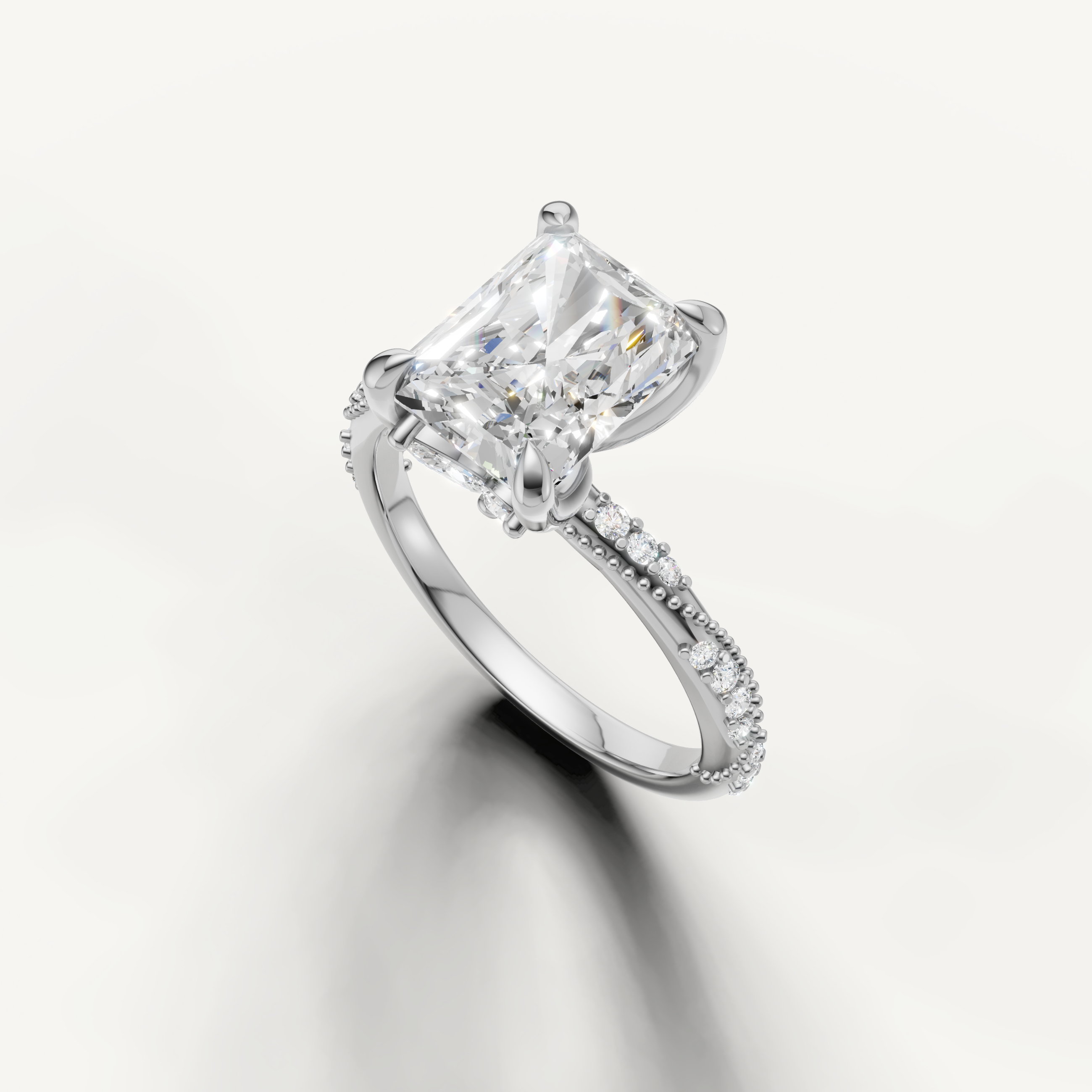 rectangular radiant lab grown diamond ring with delicate twisted pavé setting white gold