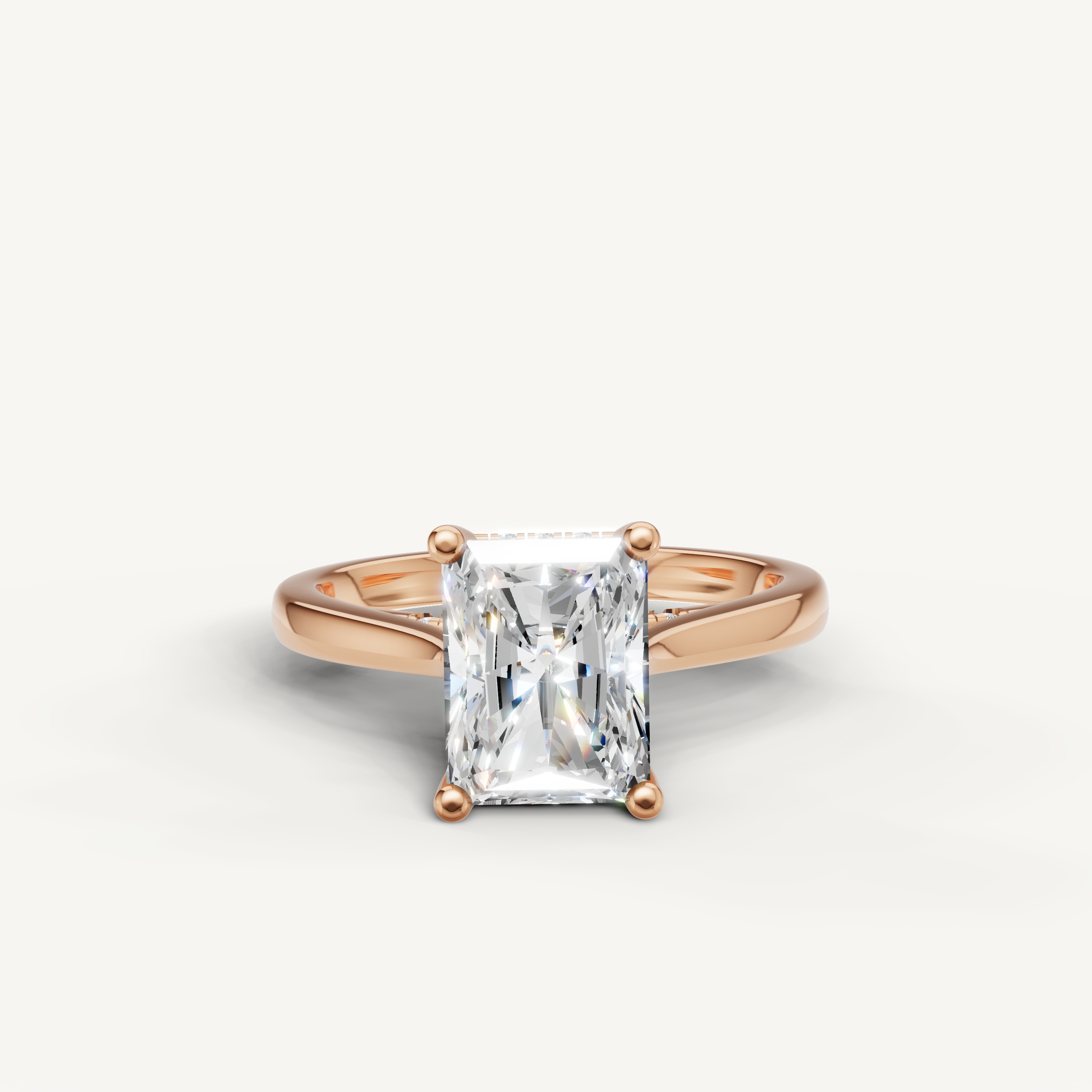 14K rose gold radiant-cut lab-grown diamond engagement ring with hidden halo design