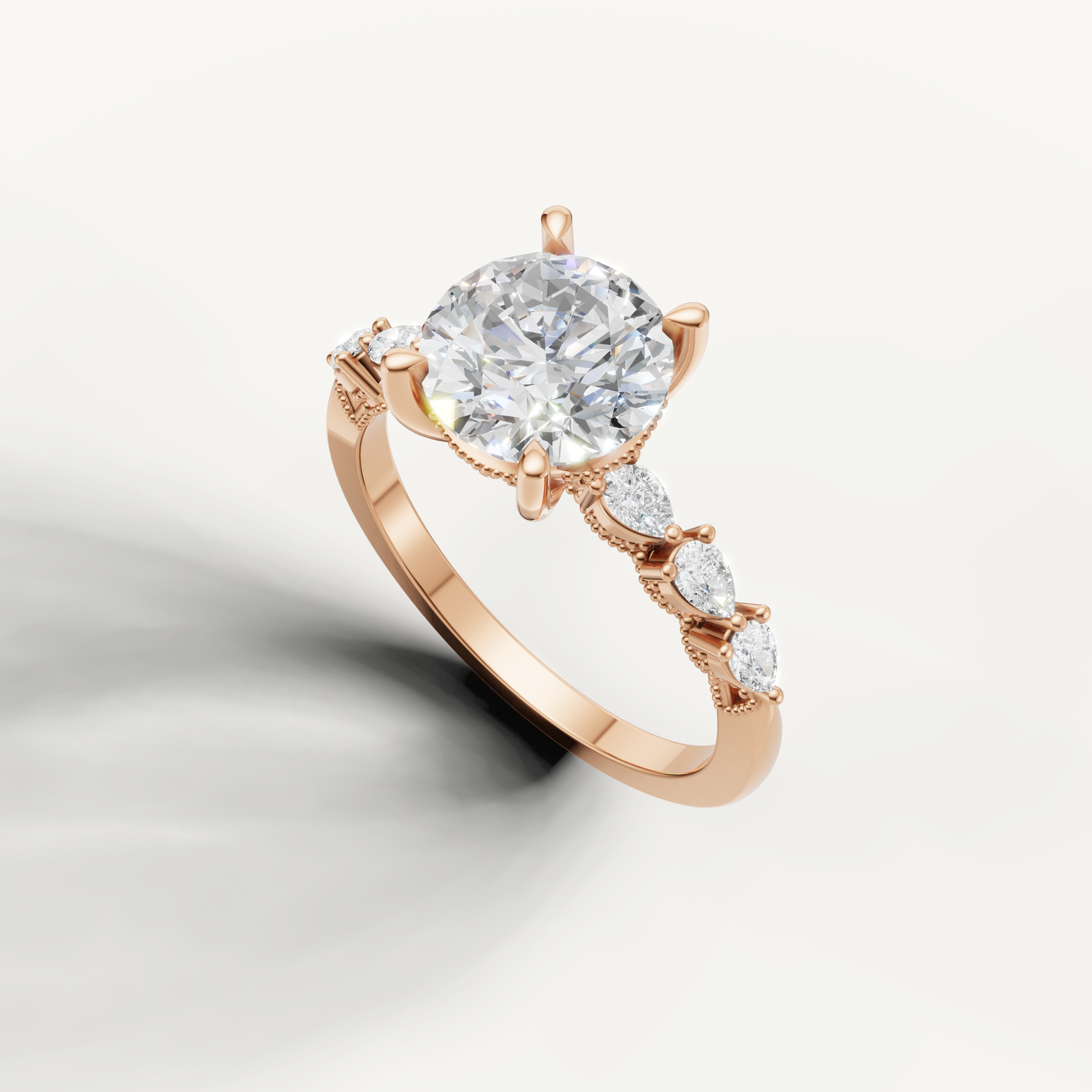 14K rose gold round cut engagement ring featuring lab grown diamond center stone and marquise side diamonds