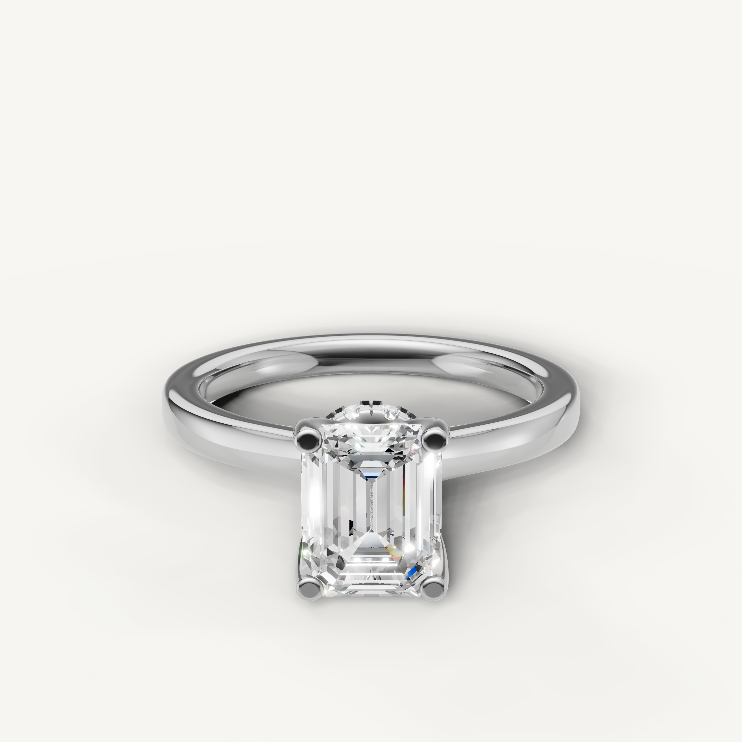 emerald cut lab grown diamond solitaire engagement ring in 14k white gold with hidden halo