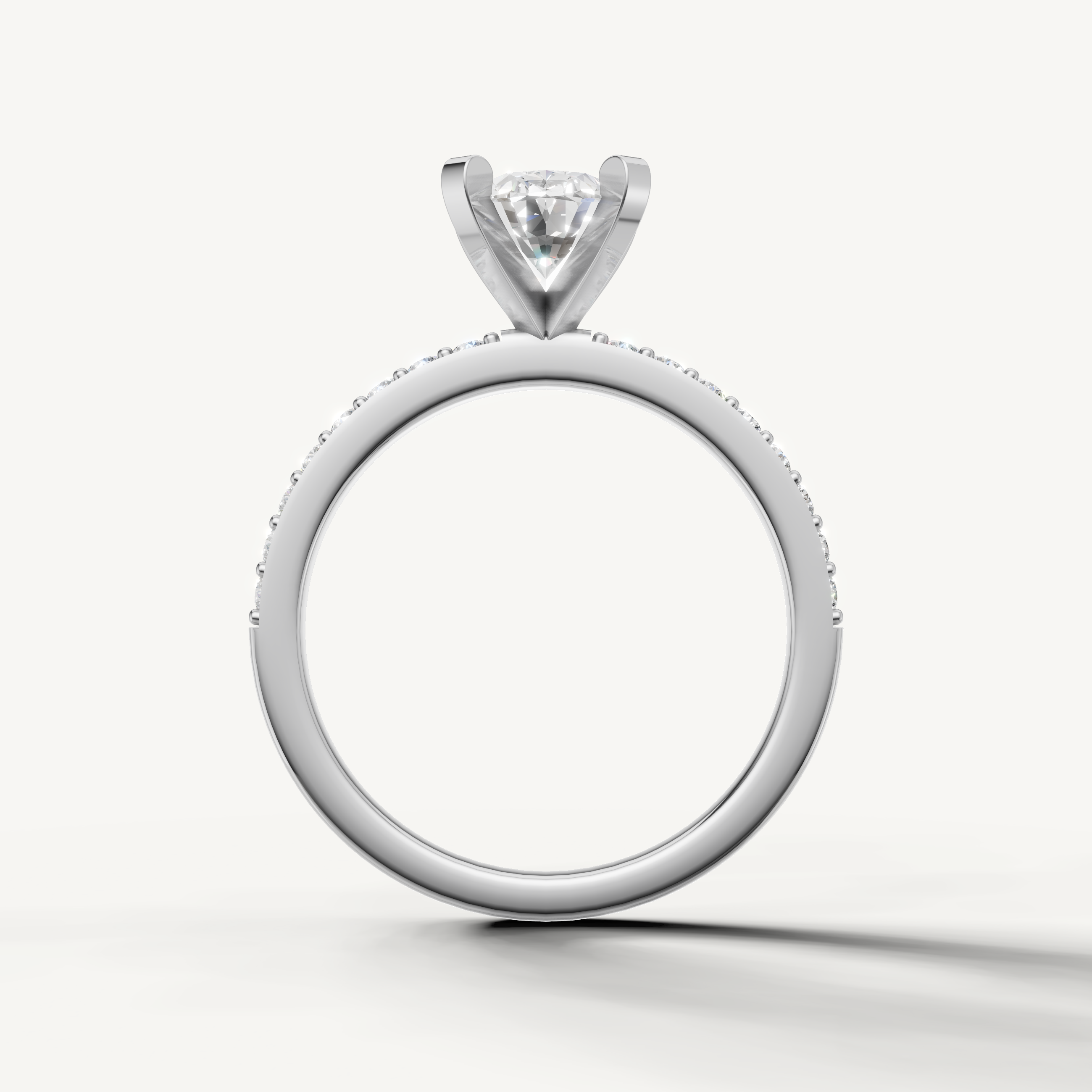 Classic oval cut diamond engagement ring in white gold micro pavé design