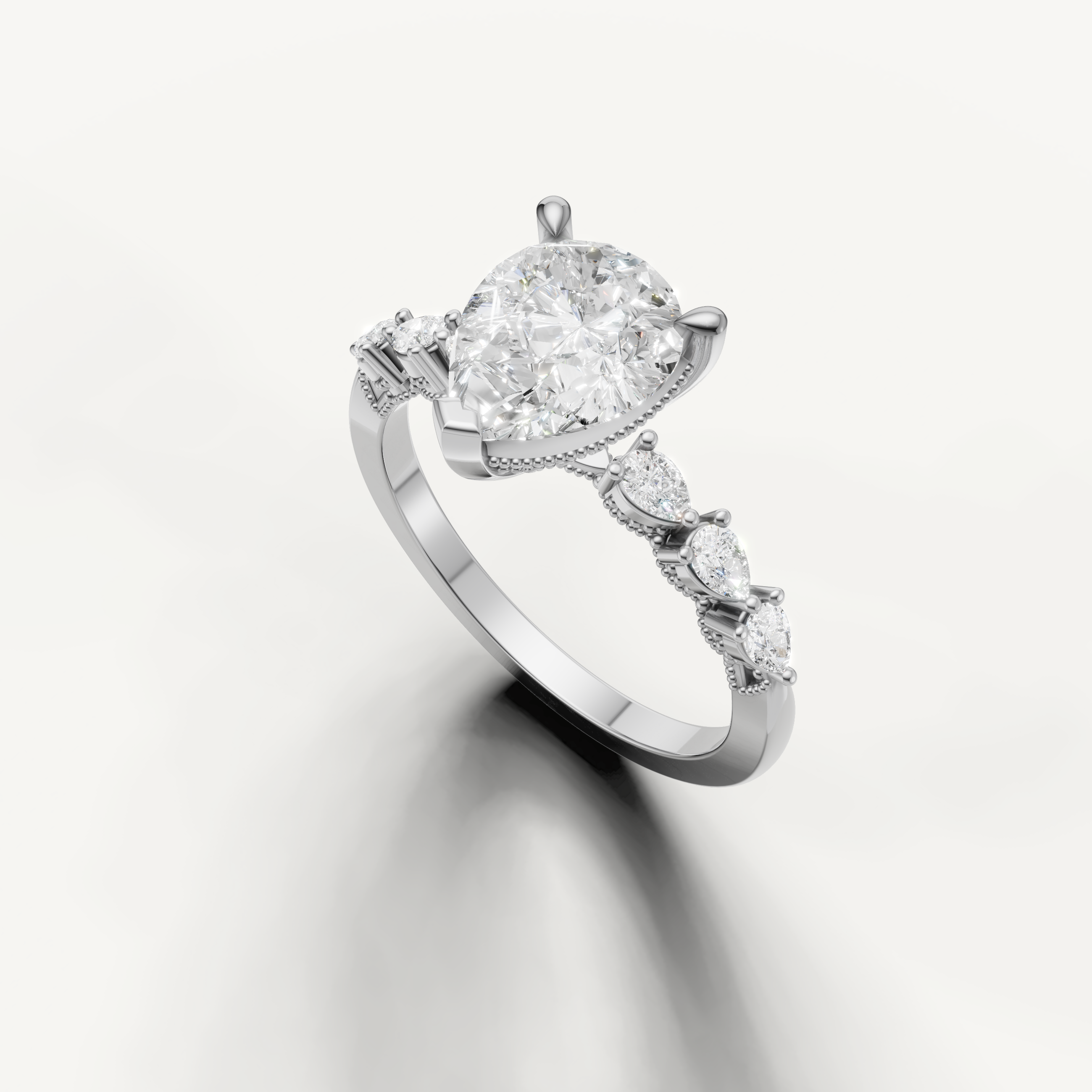 14K white gold pear cut engagement ring featuring lab grown diamond center stone and marquise side diamonds