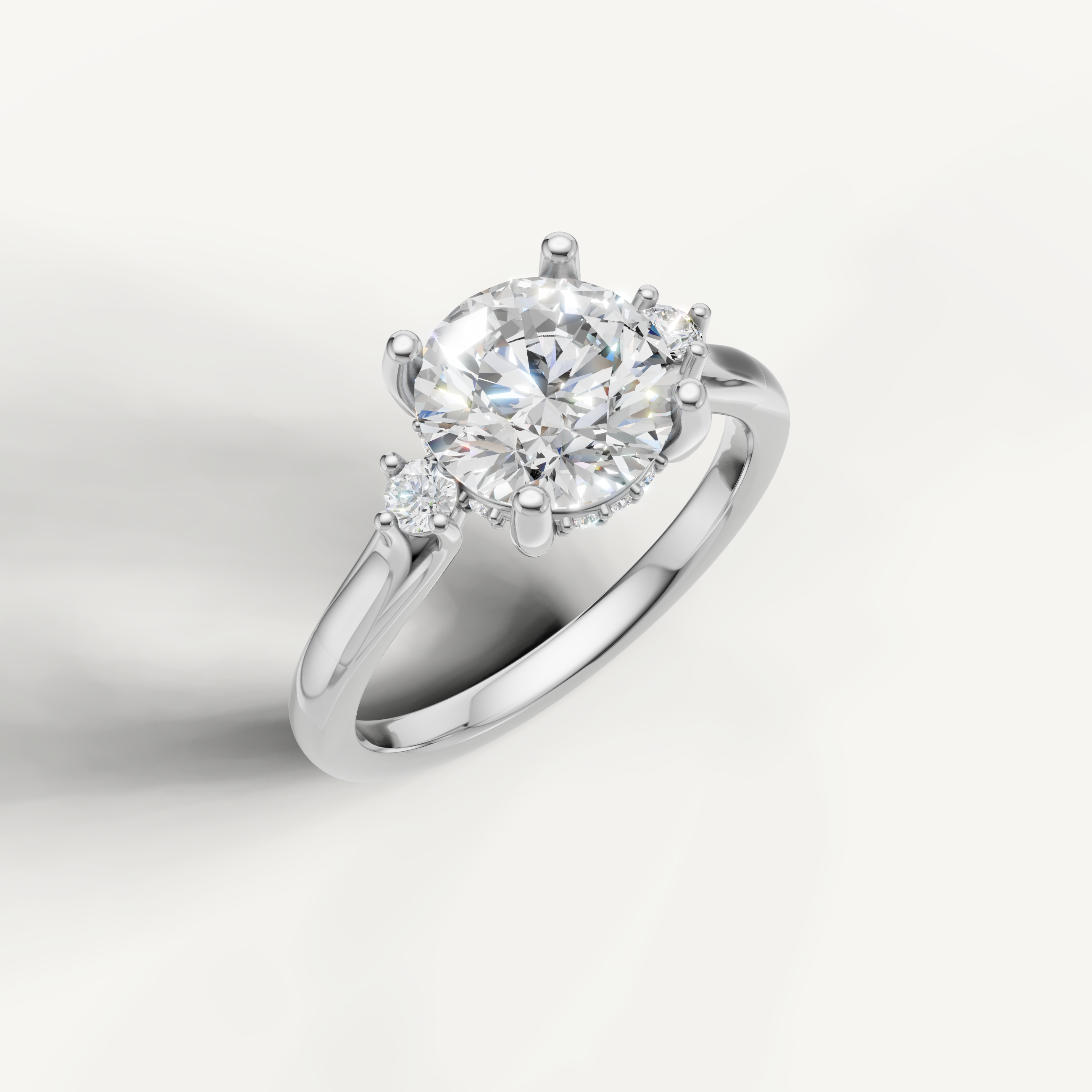 White gold round brilliant diamond ring with timeless center stone by Raul Diamonds