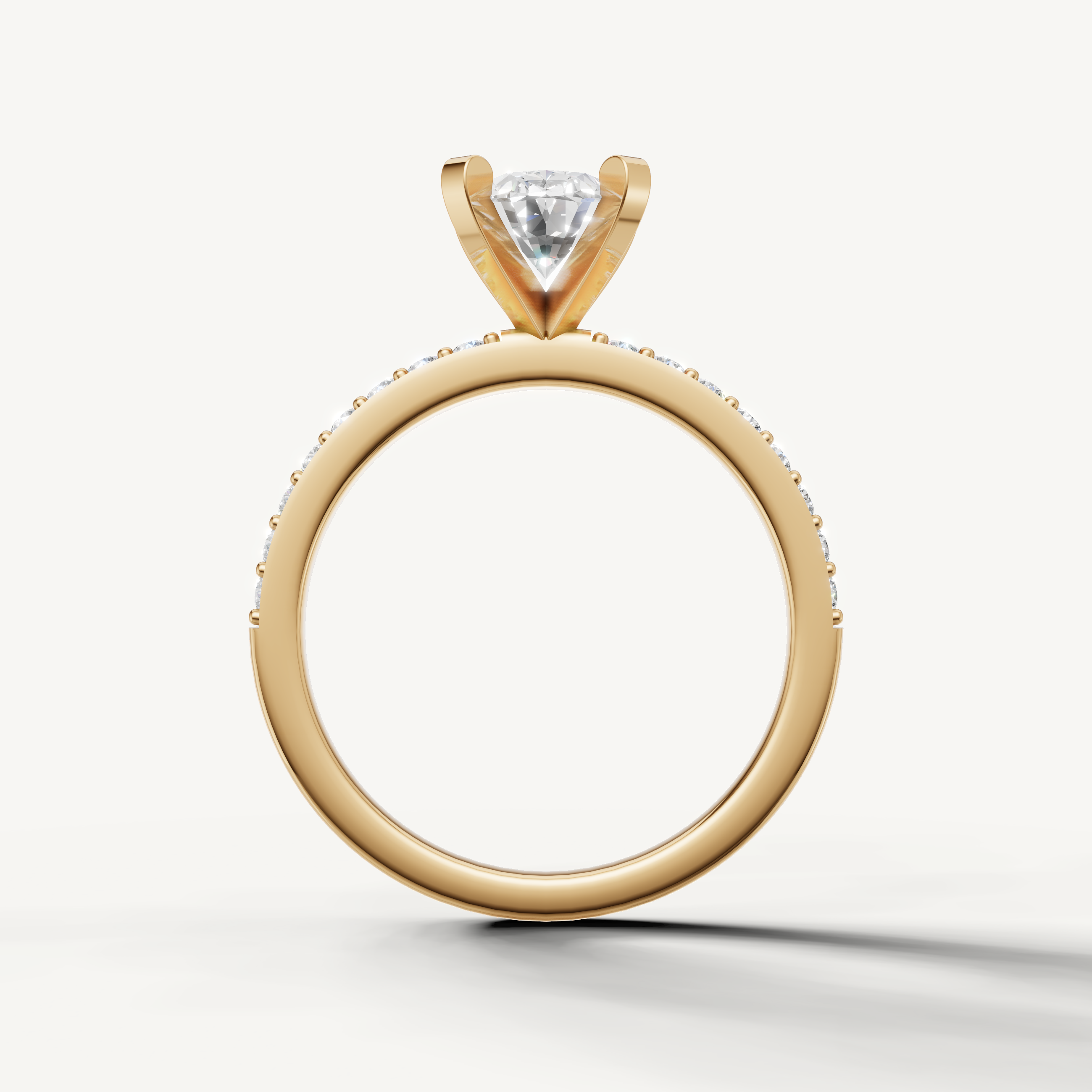 Classic oval cut diamond engagement ring in yellow gold micro pavé setting