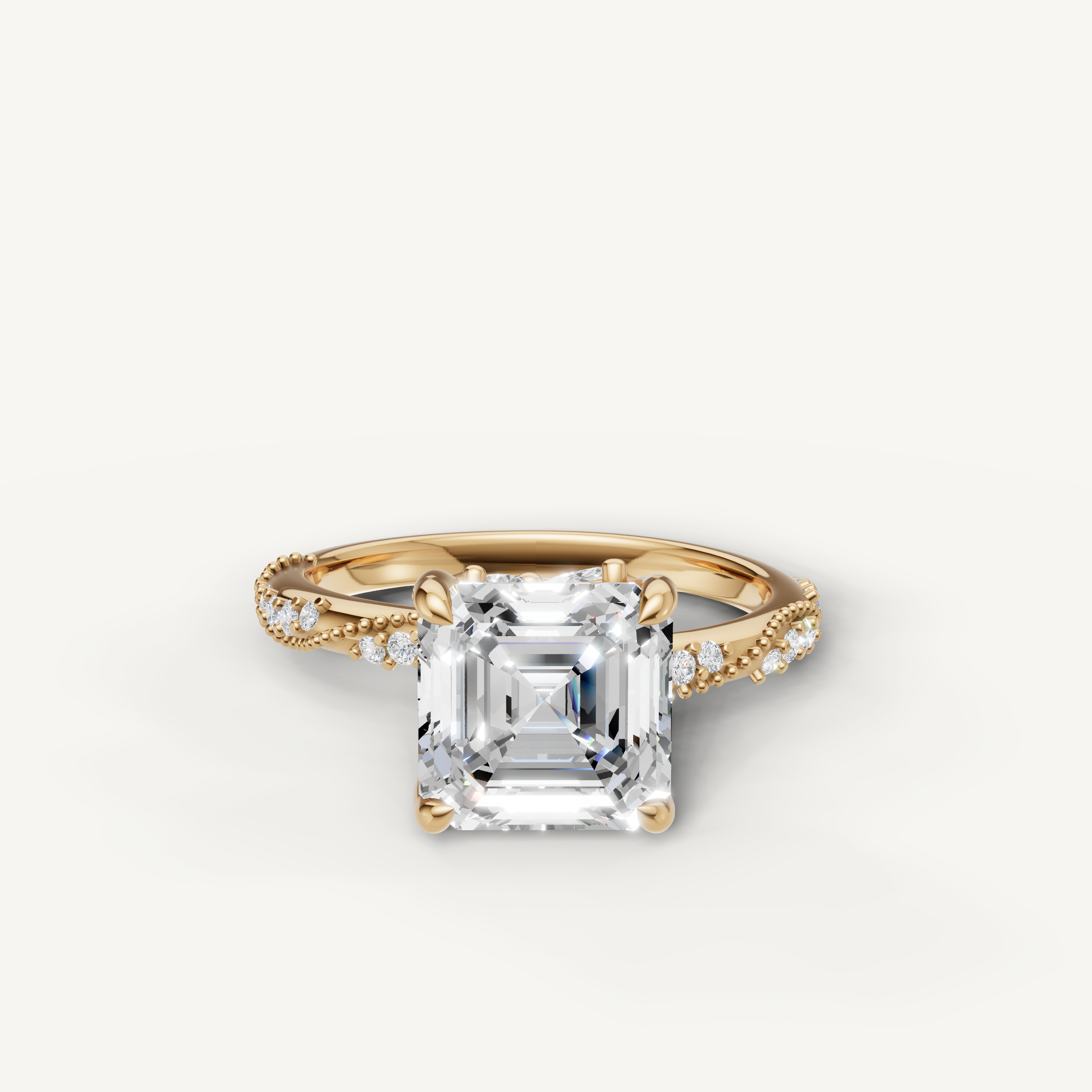 asscher cut lab grown diamond engagement ring with twisted pavé split shank yellow gold