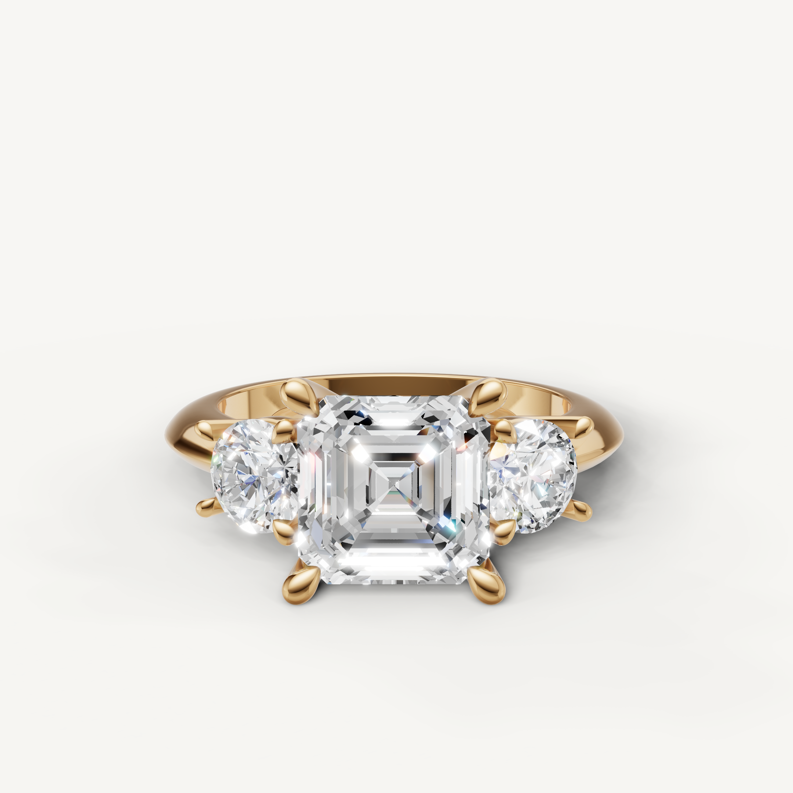 Asscher cut three stone lab grown diamond engagement ring in 14K yellow gold