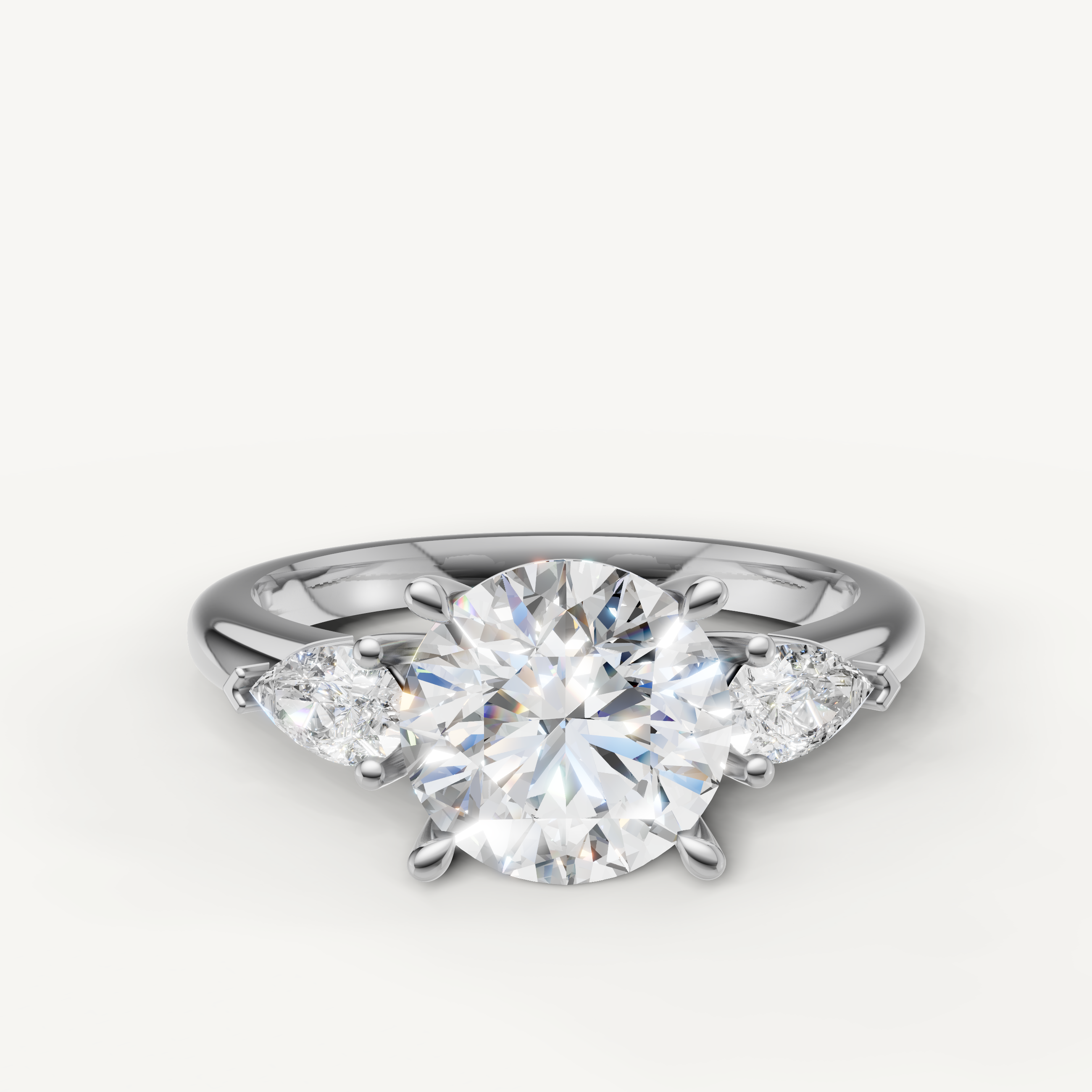 round cut lab grown diamond engagement ring with marquise side stones in 14k white gold