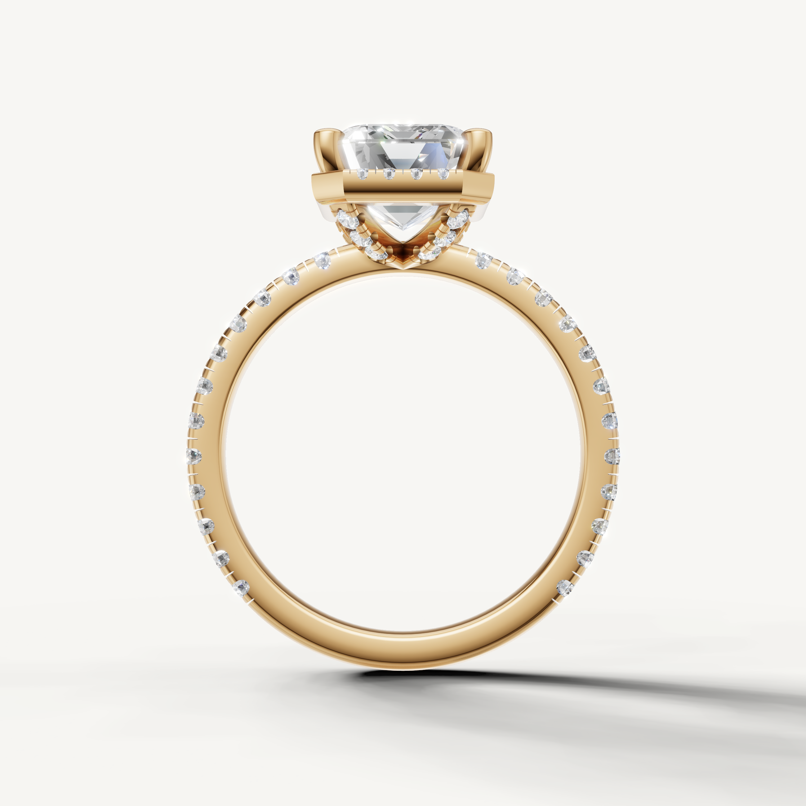 Step cut emerald lab grown diamond ring with hidden halo pavé band yellow gold luxury