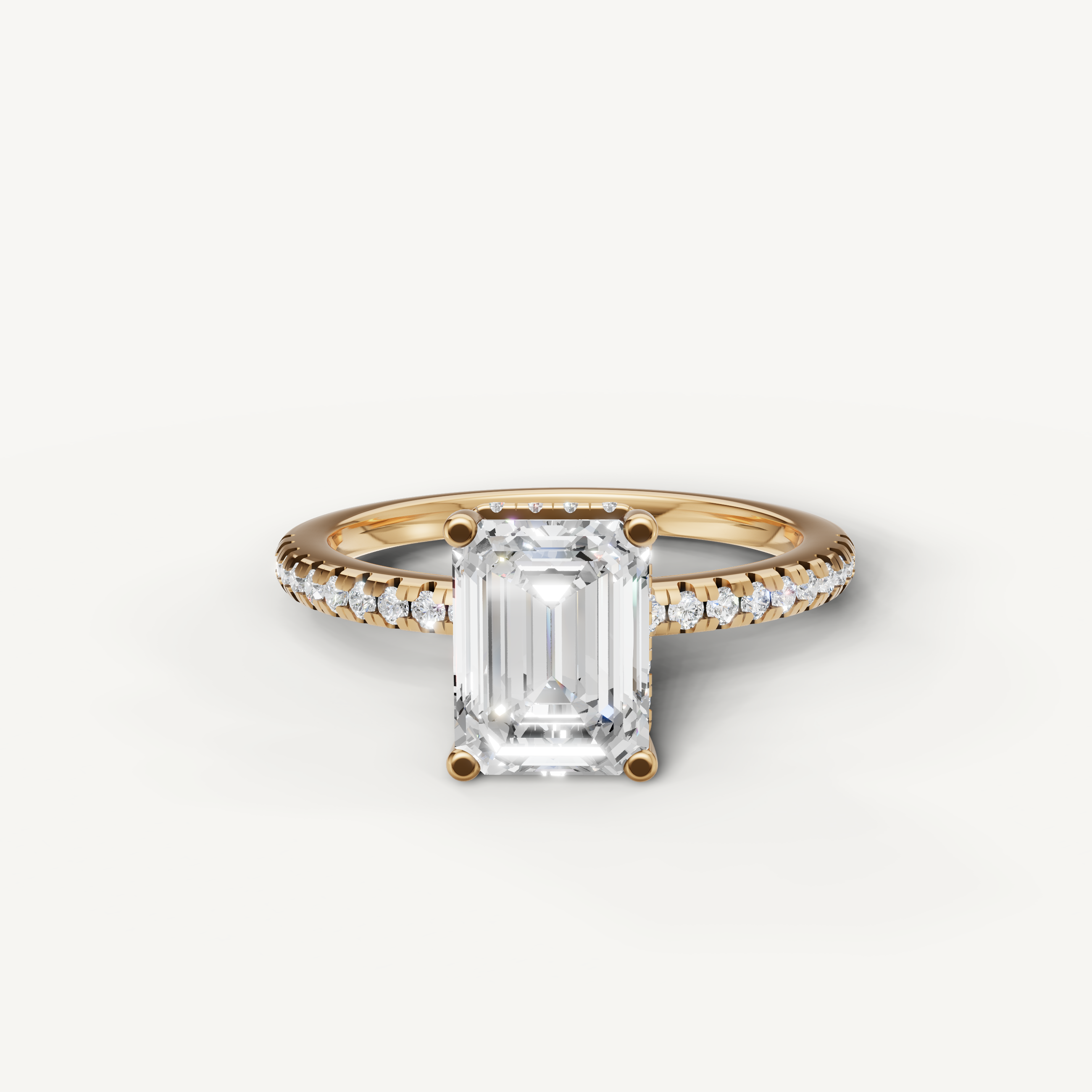 emerald cut lab grown diamond engagement ring with pavé band in 14k yellow gold
