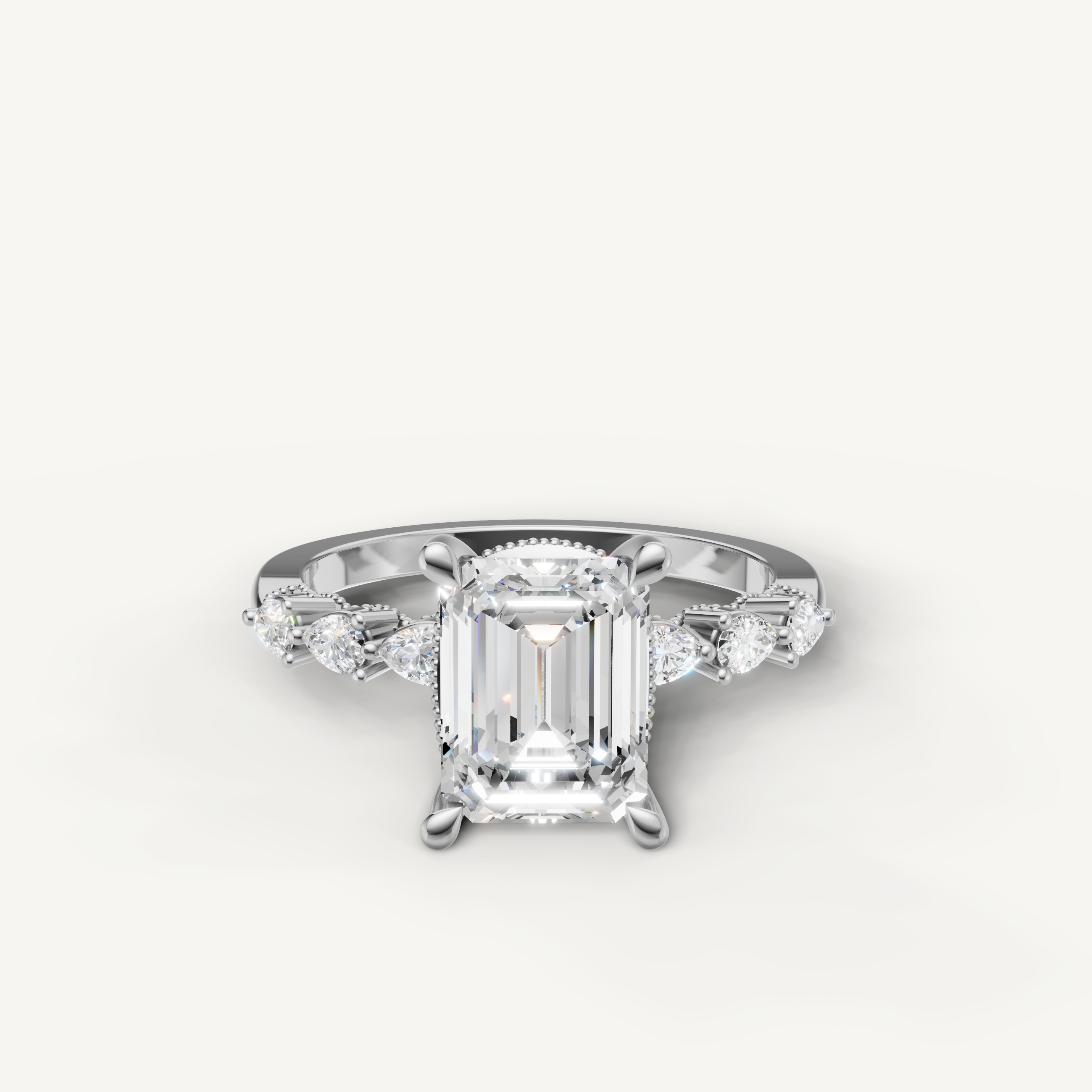 emerald cut lab grown diamond engagement ring with marquise and baguette side stones white gold