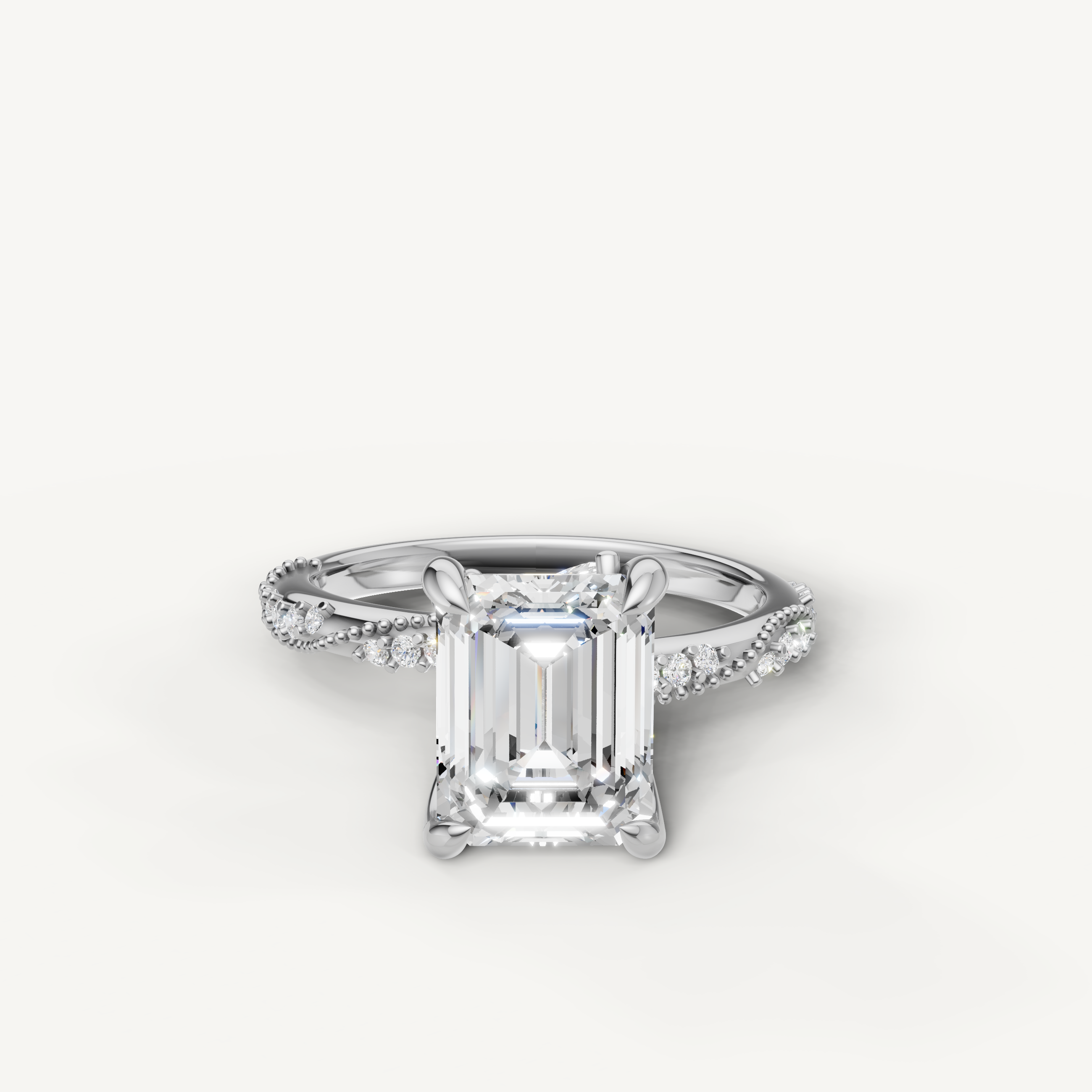 emerald cut lab grown diamond engagement ring with twisted pavé split shank white gold