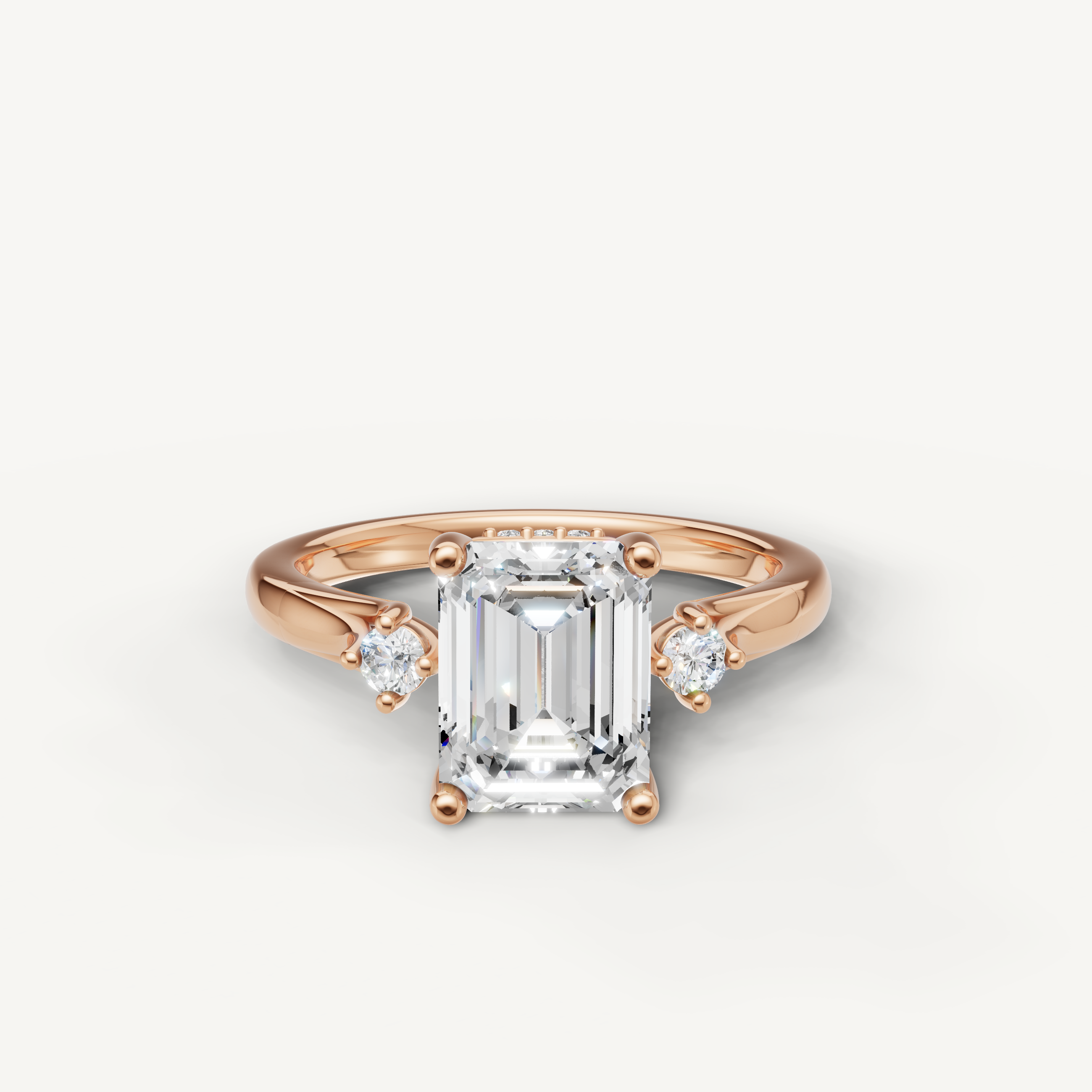 Emerald cut lab grown diamond engagement ring in 14K rose gold with petite side diamonds