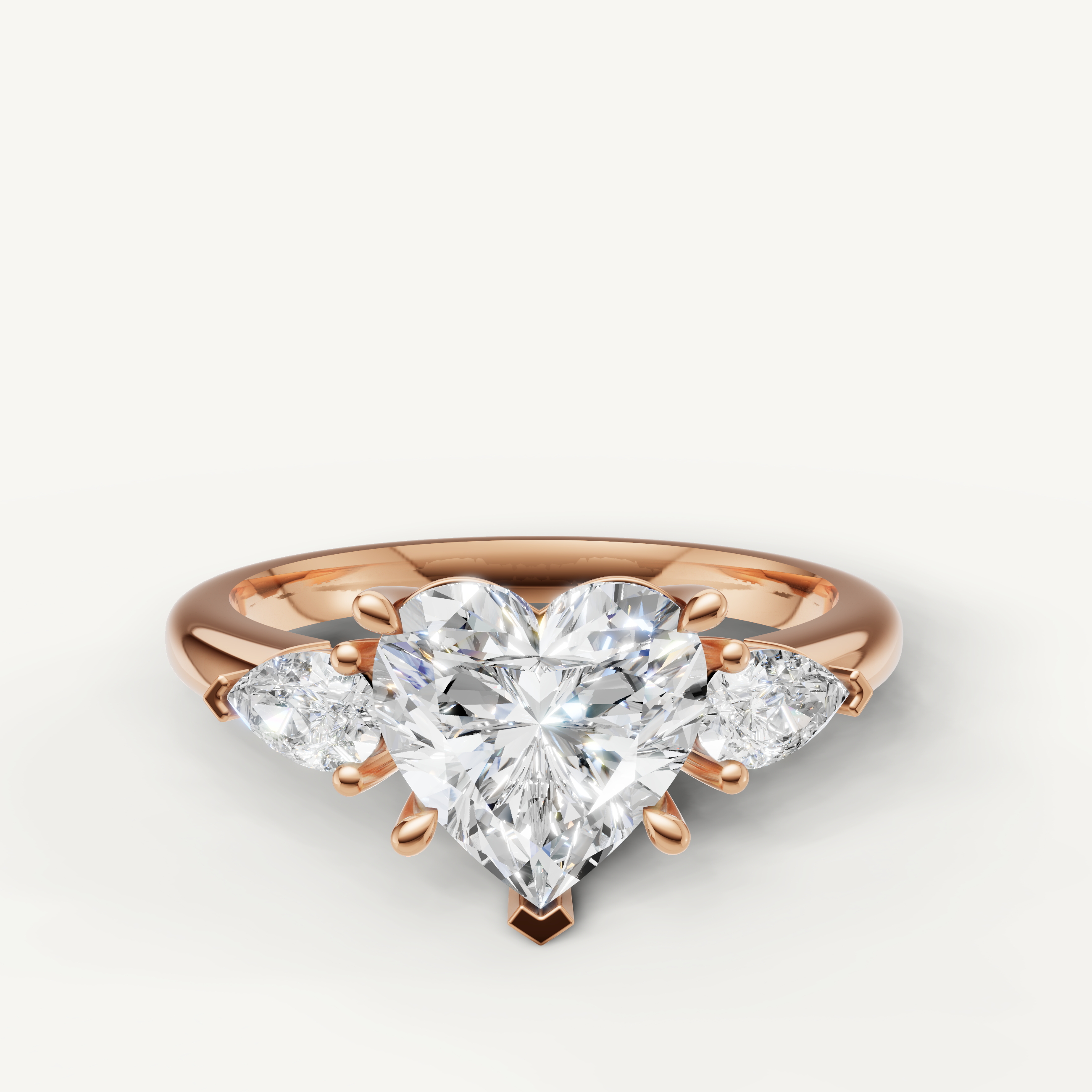heart cut lab grown diamond engagement ring with pear side stones rose gold