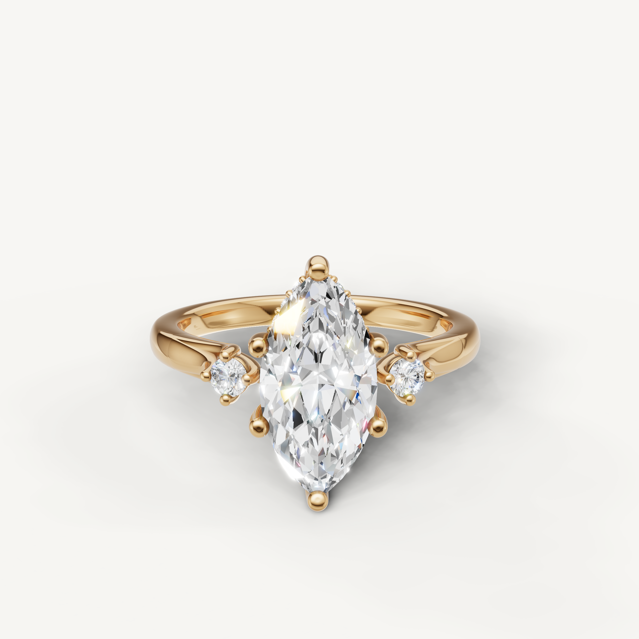 Marquise cut lab grown diamond engagement ring in 14K yellow gold with round side stones by Raul Diamonds