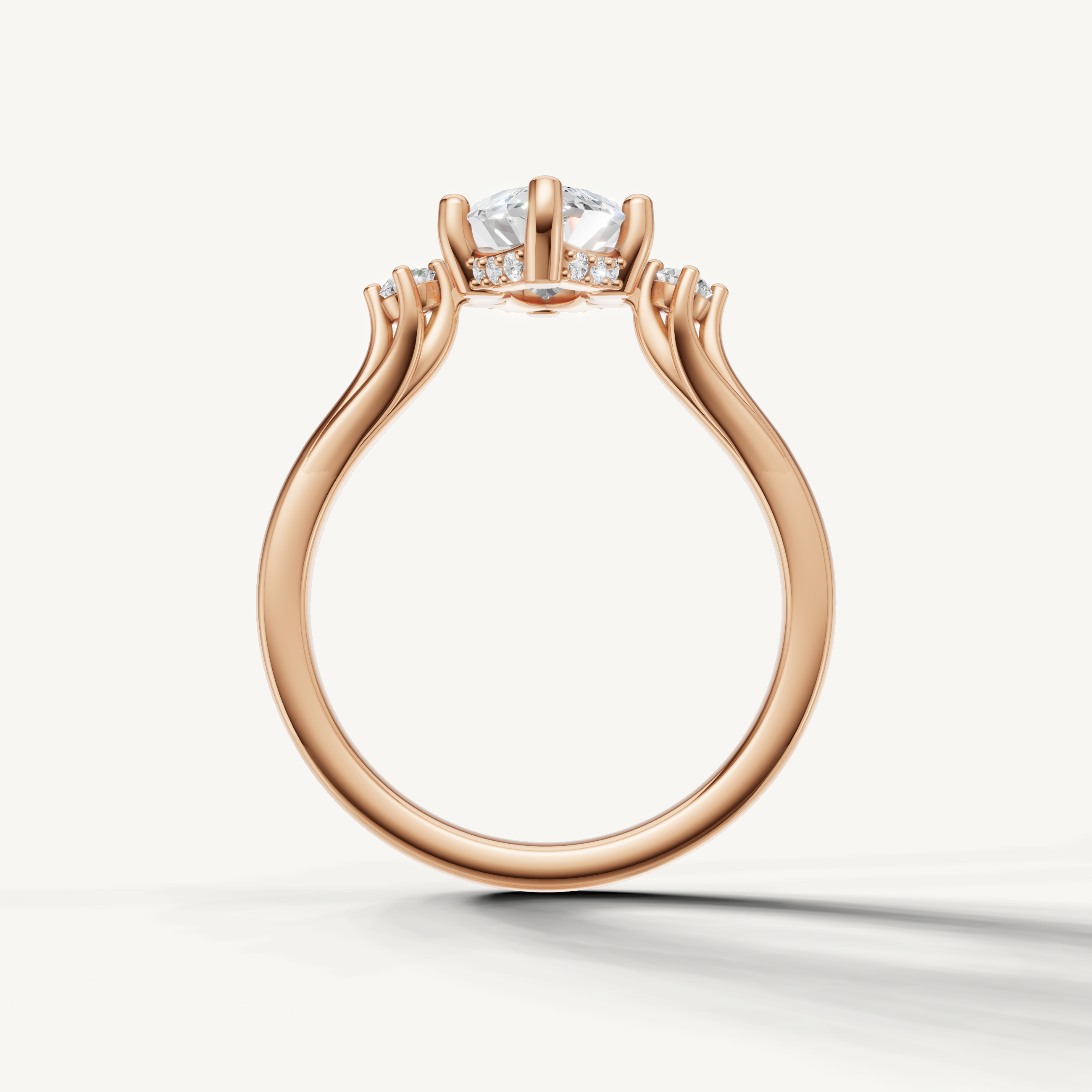 Modern marquise cut lab grown diamond ring in rose gold with elegant side stone accents