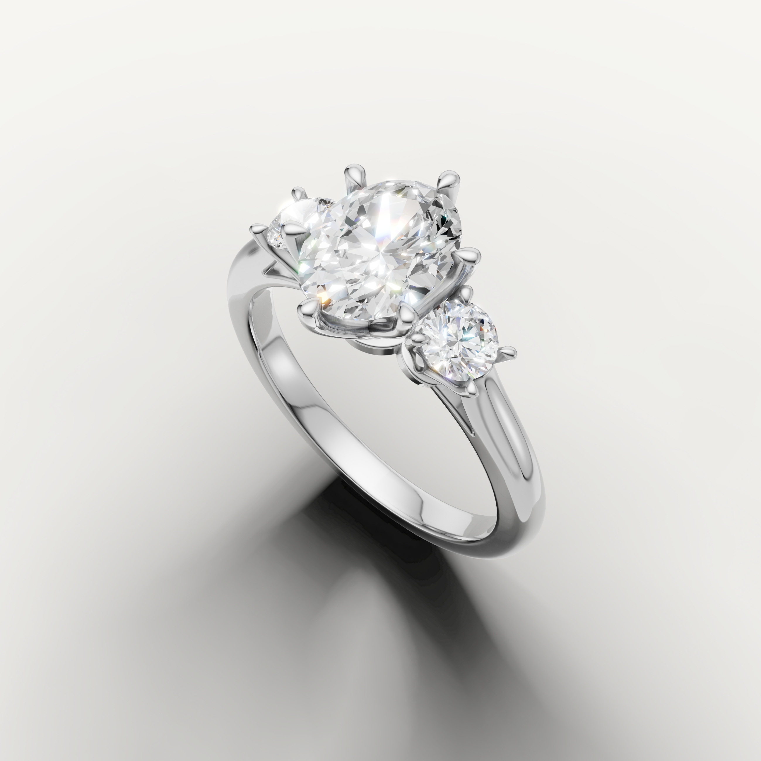 Three stone oval cut lab grown diamond ring in white gold classic setting