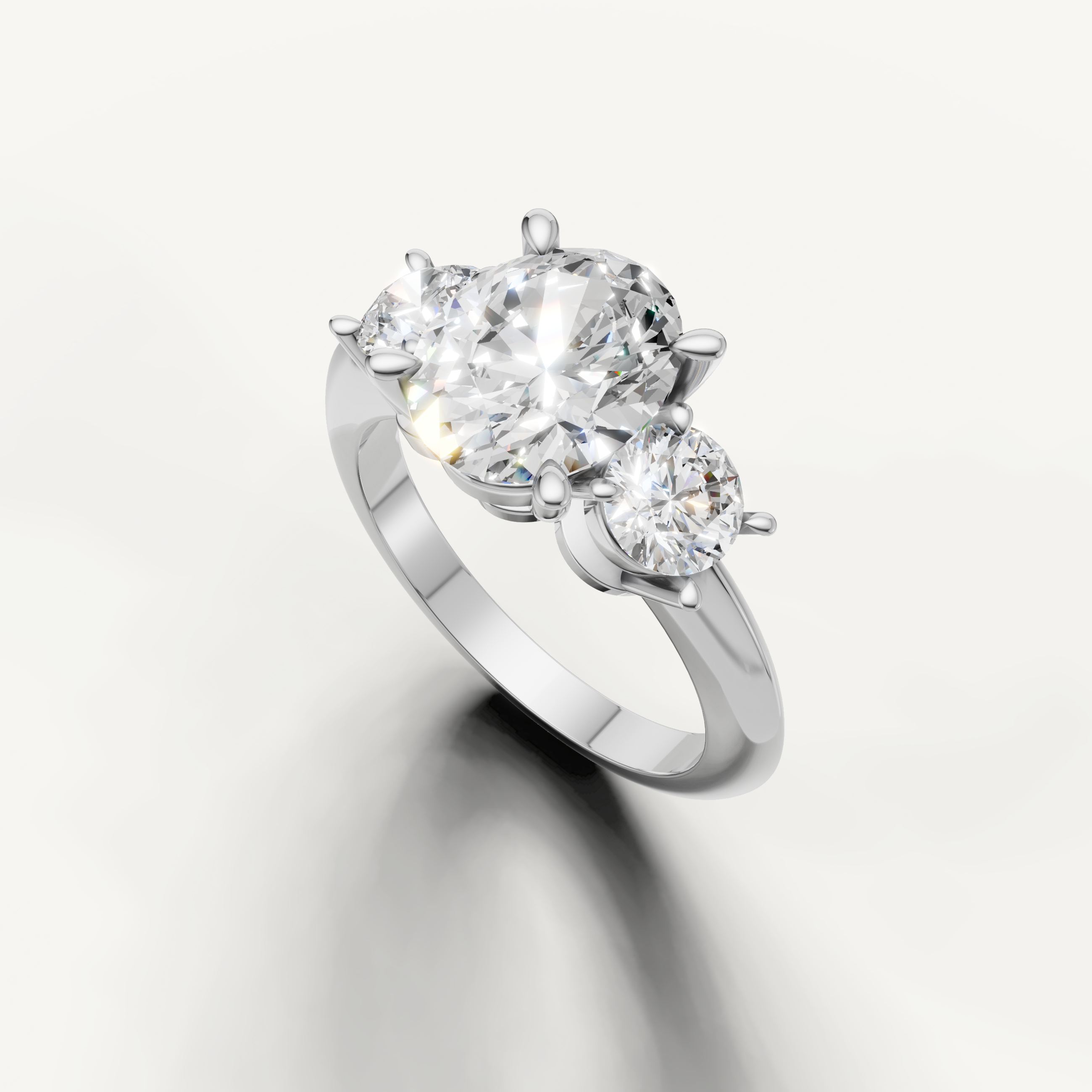Three stone oval cut lab grown diamond ring in white gold classic setting