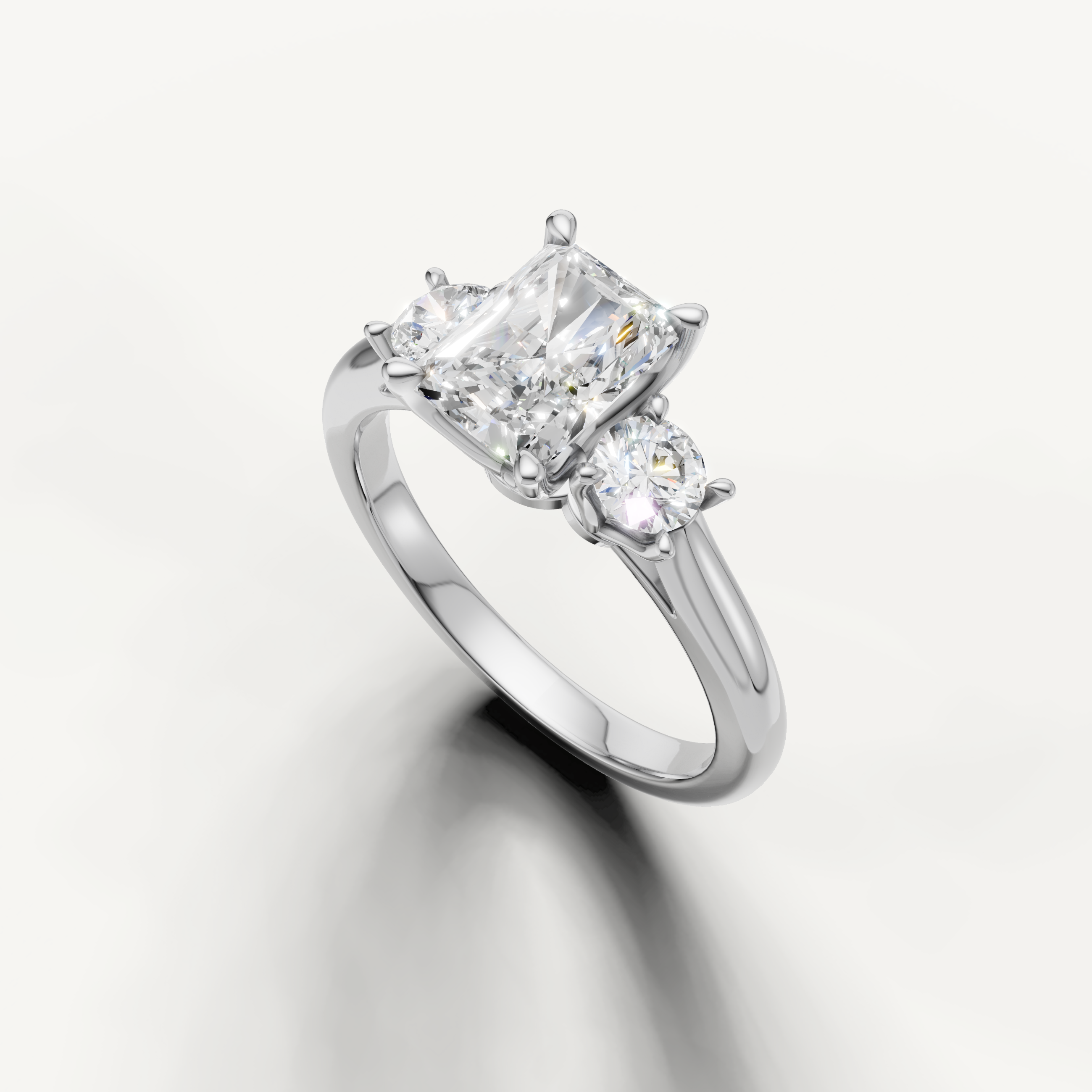 Three stone radiant cut lab grown diamond ring in white gold classic setting