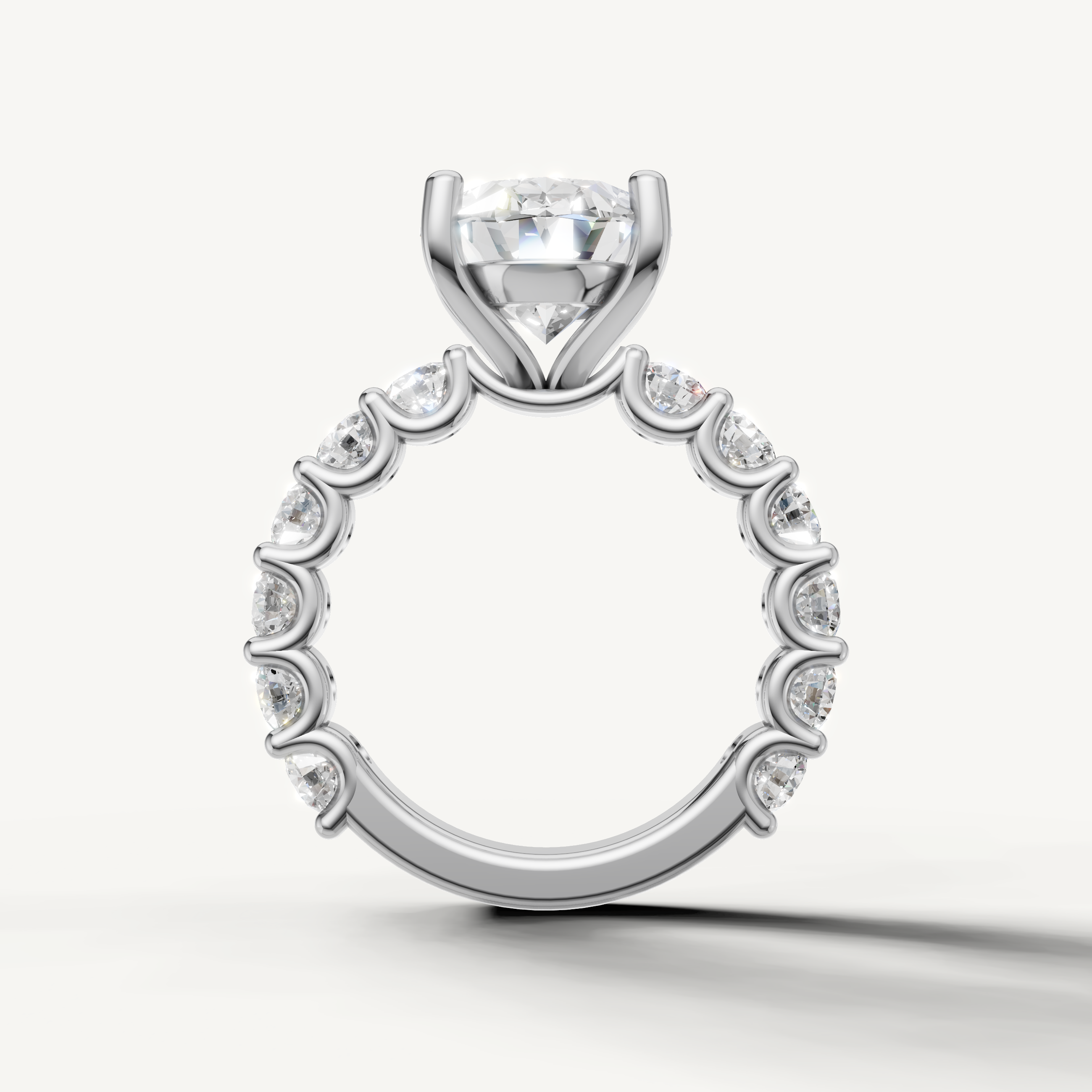 Classic oval engagement ring with open gallery shared prong band white gold