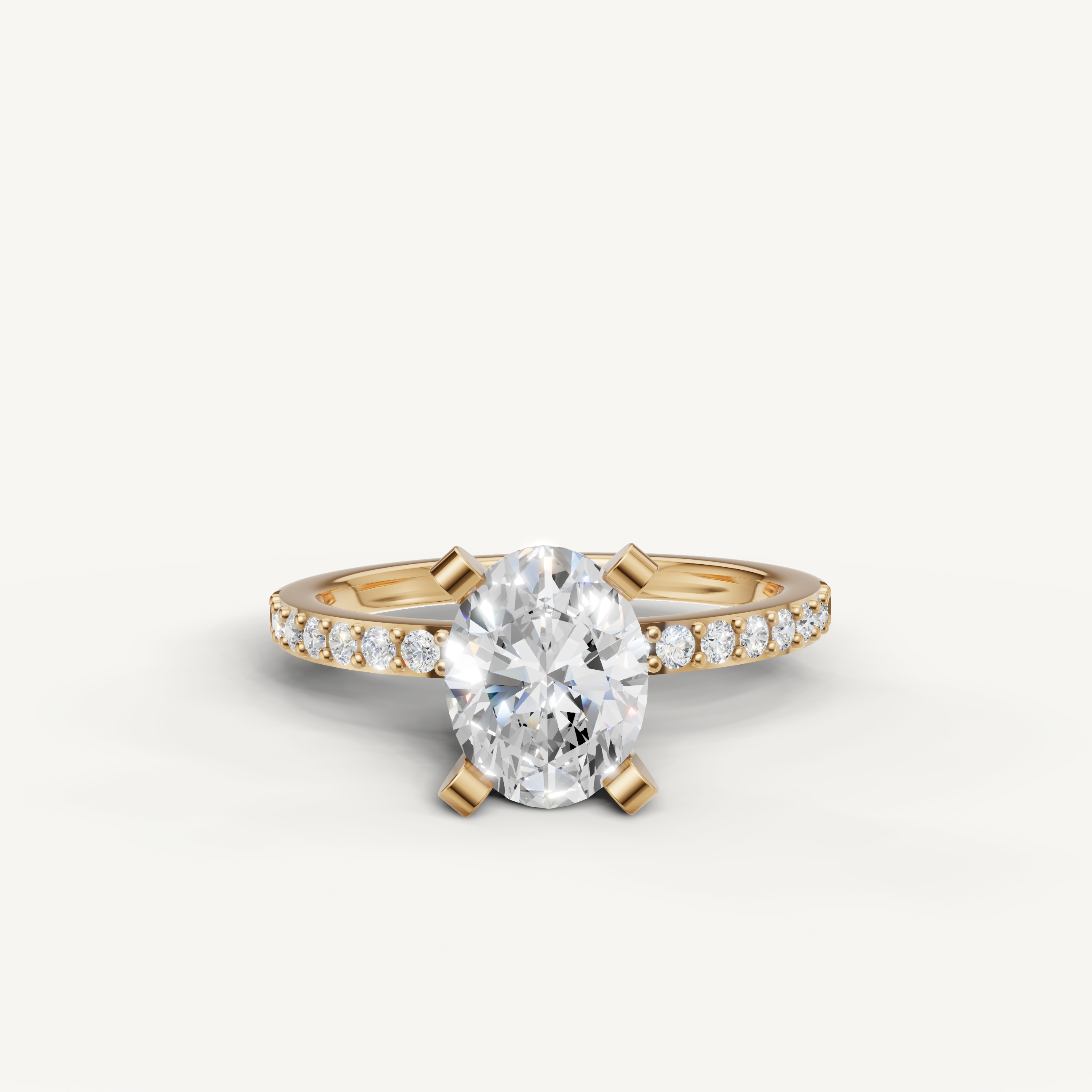 Oval cut lab grown diamond engagement ring in 14K yellow gold with pavé band