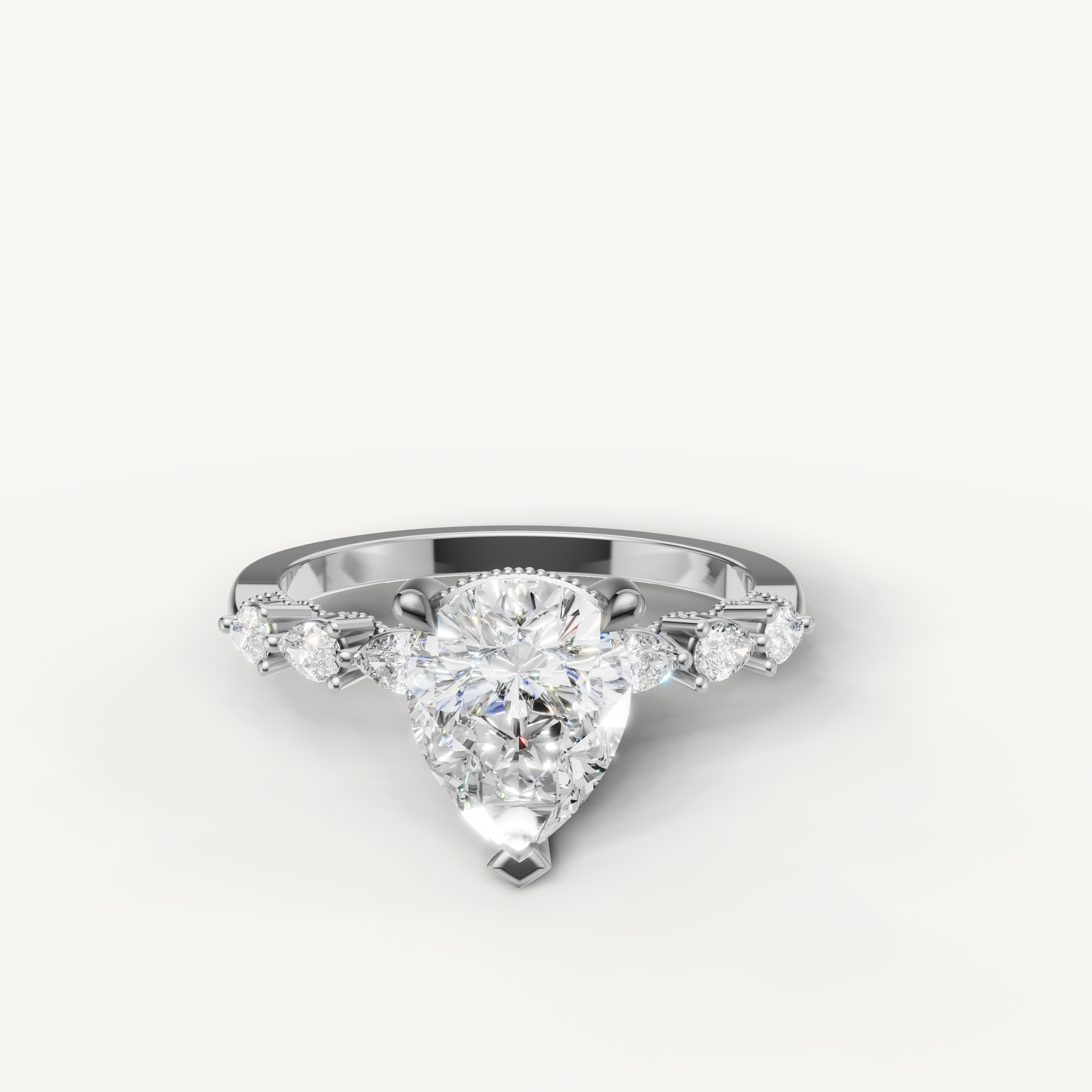 Pear cut lab grown diamond engagement ring in 14K white gold with marquise side stones by Raul Diamonds