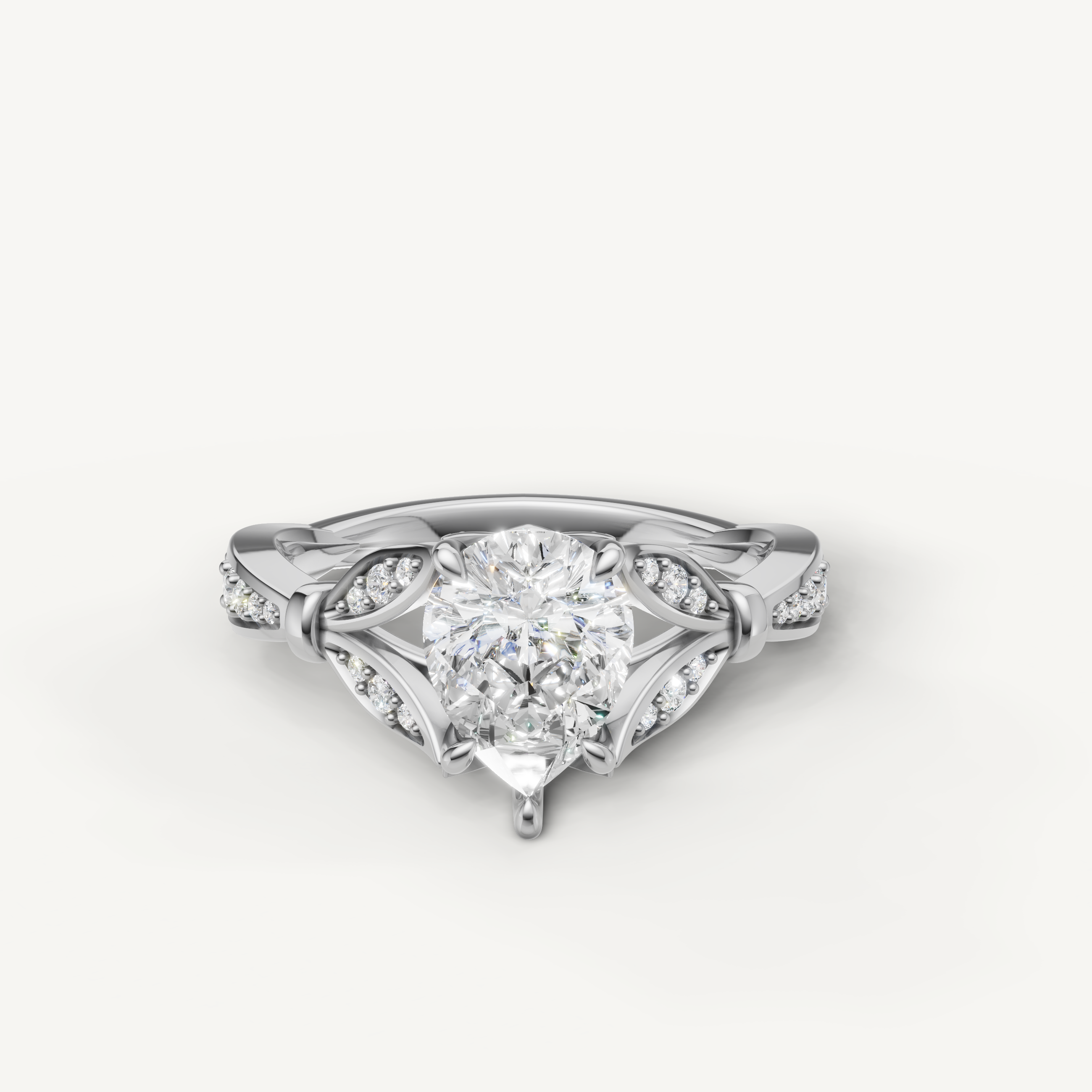 Pear cut lab grown diamond engagement ring in 14K white gold with intricate pavé detailing by Raul Diamonds