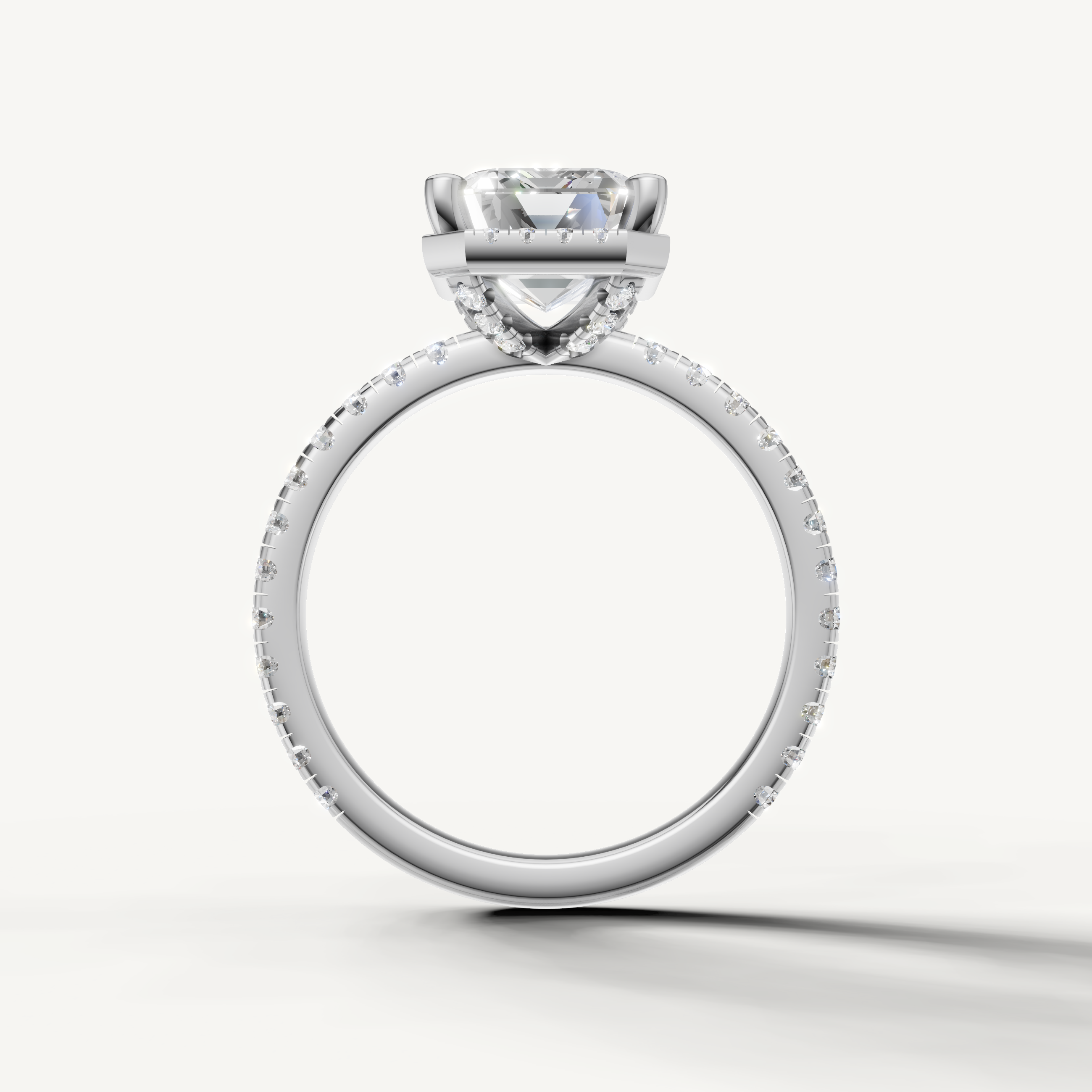 Step cut emerald lab grown diamond ring with hidden halo pavé band white gold luxury