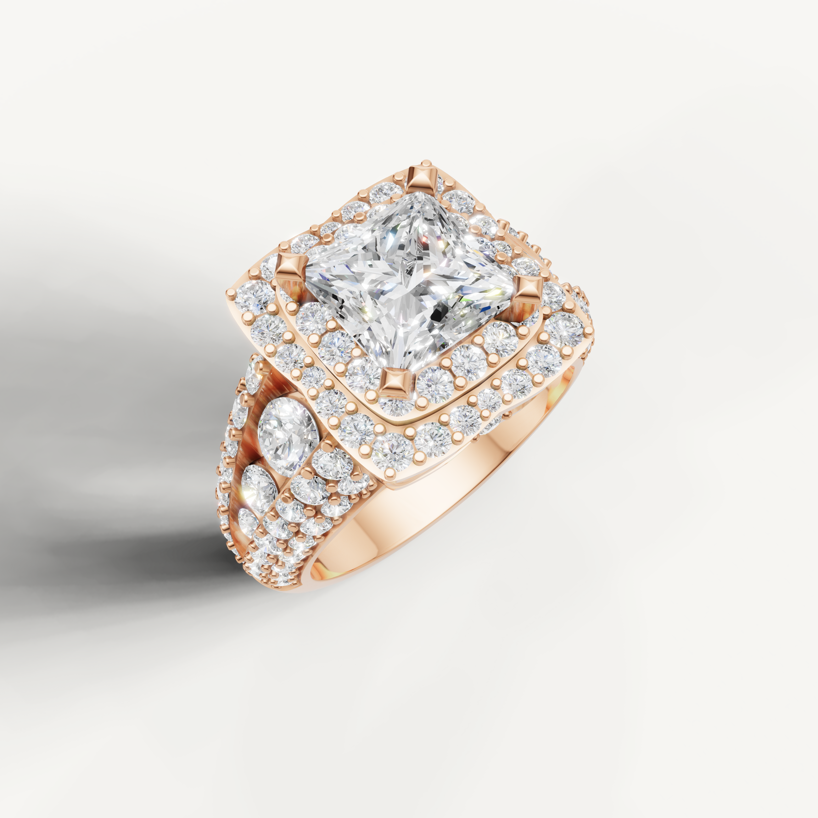 Luxury princess diamond engagement ring in rose gold with double halo design.