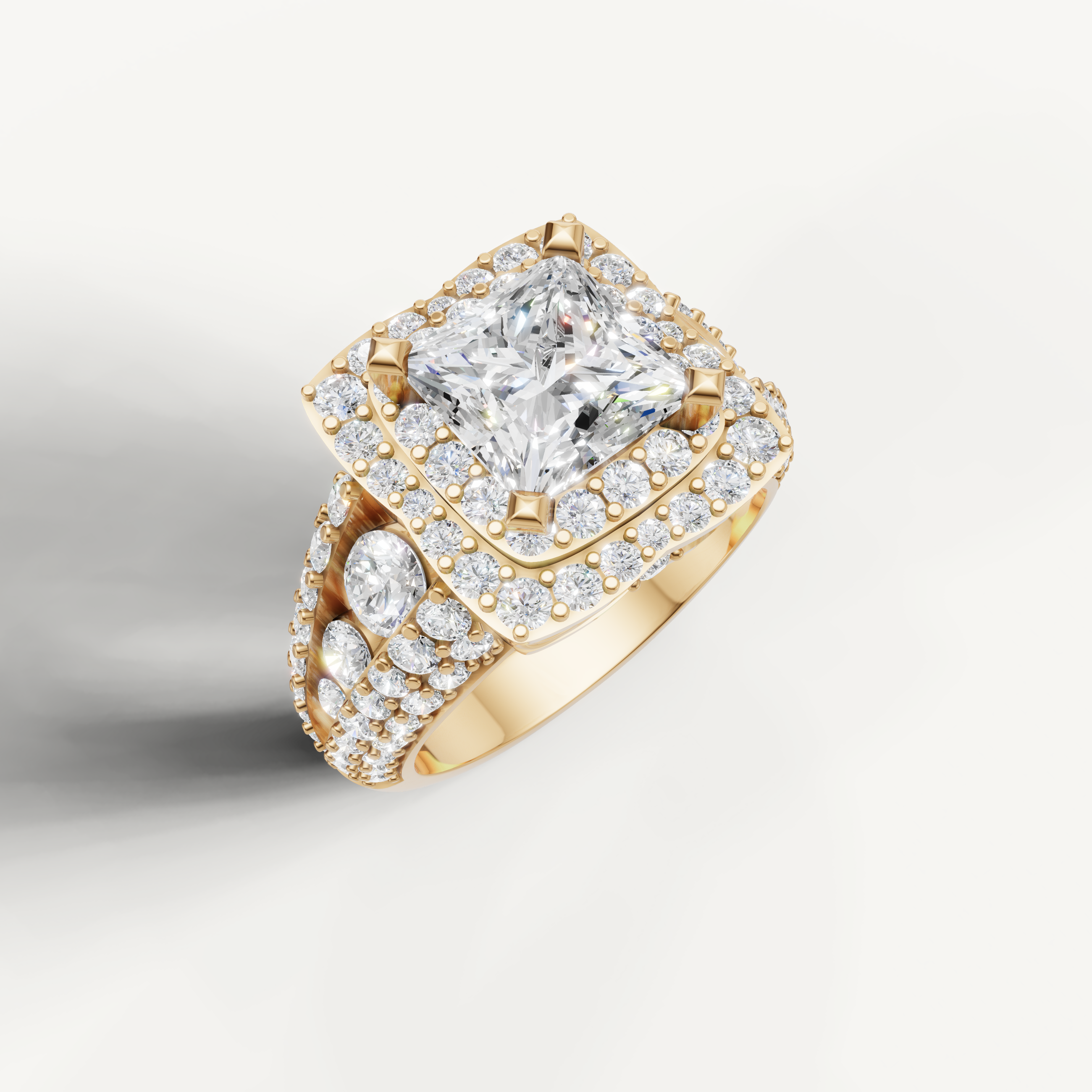 Princess cut diamond ring with double halo setting by Raul Diamonds.