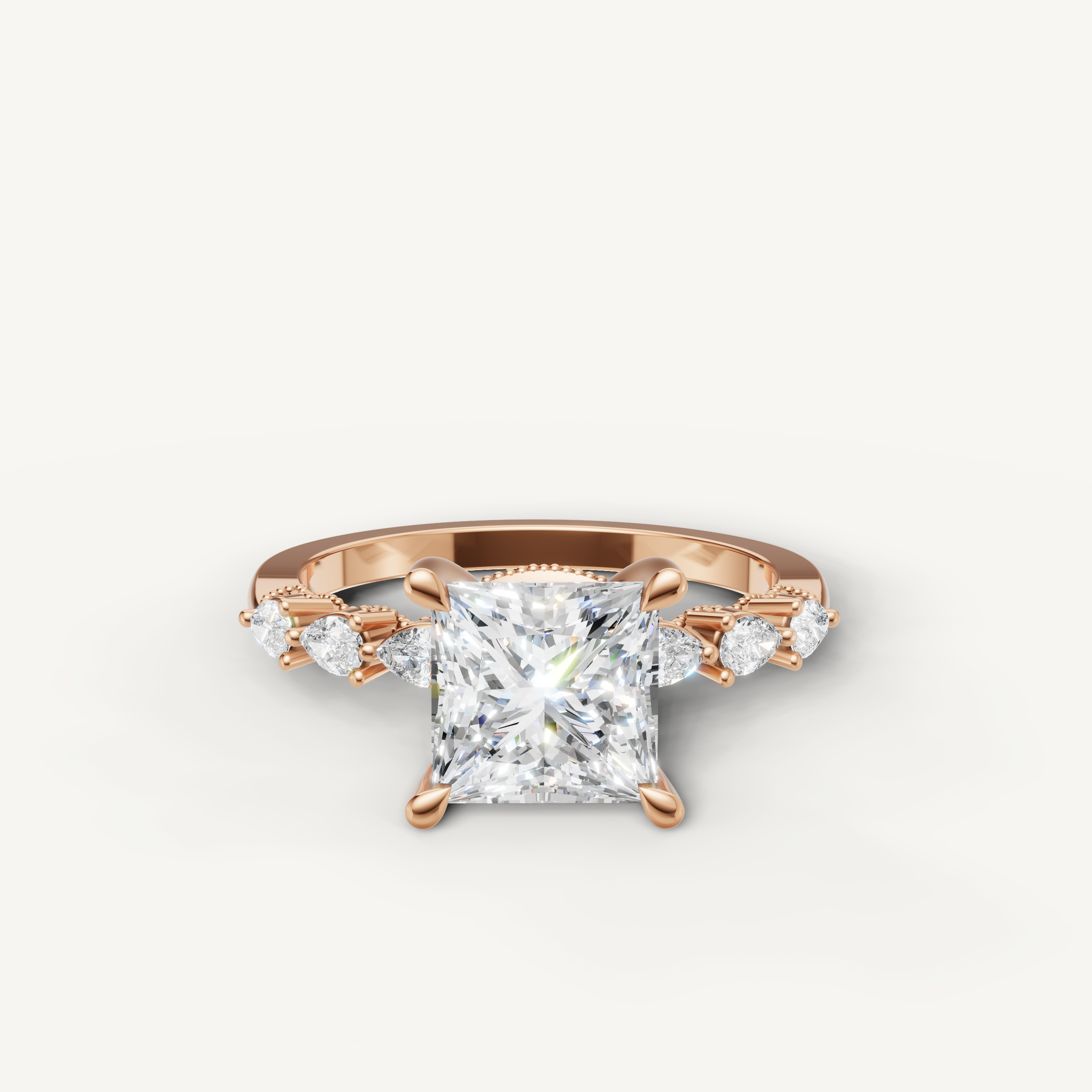 Princess cut lab grown diamond engagement ring in 14K rose gold with marquise side stones by Raul Diamonds