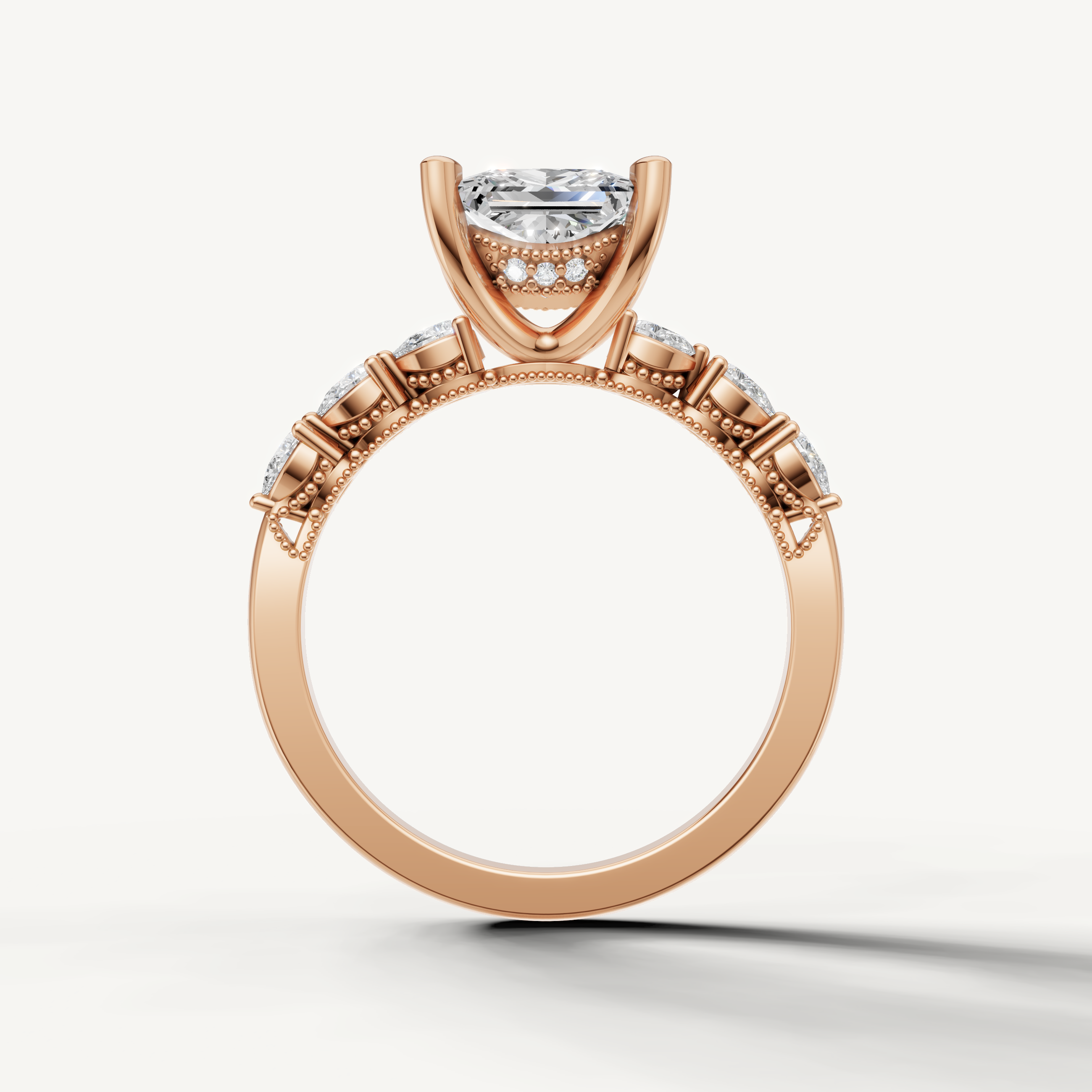 14K rose gold princess cut engagement ring featuring lab grown diamond center stone and marquise side diamonds