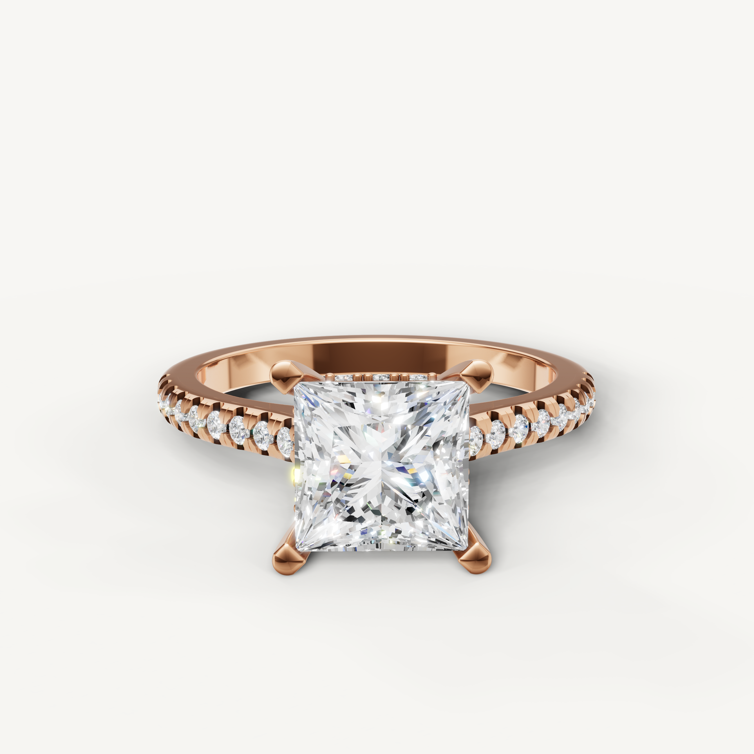 Princess cut lab grown diamond engagement ring with pavé band in 14K rose gold by Raul Diamonds
