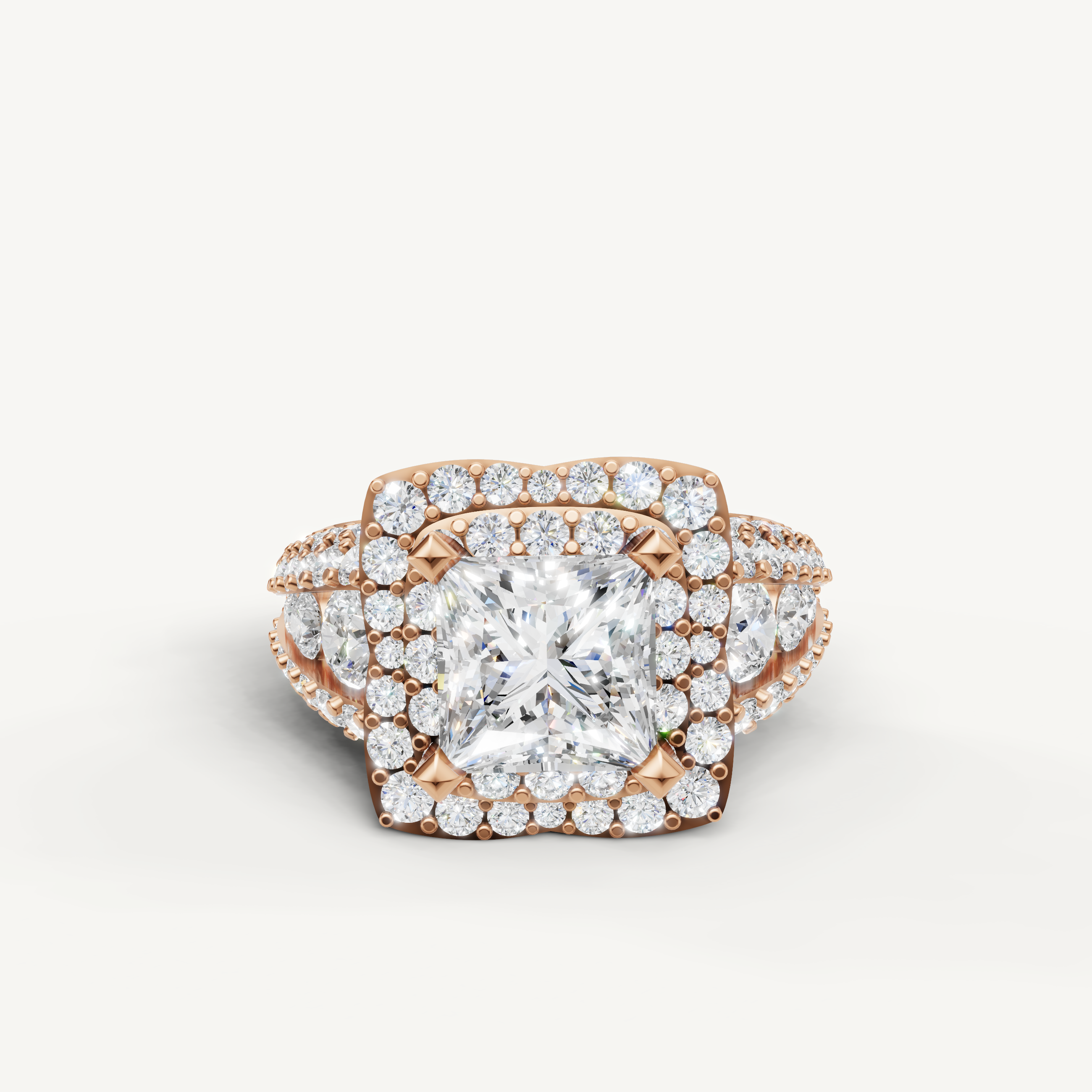 Rose gold princess cut halo ring with brilliant pavé diamonds by Raul Diamonds.