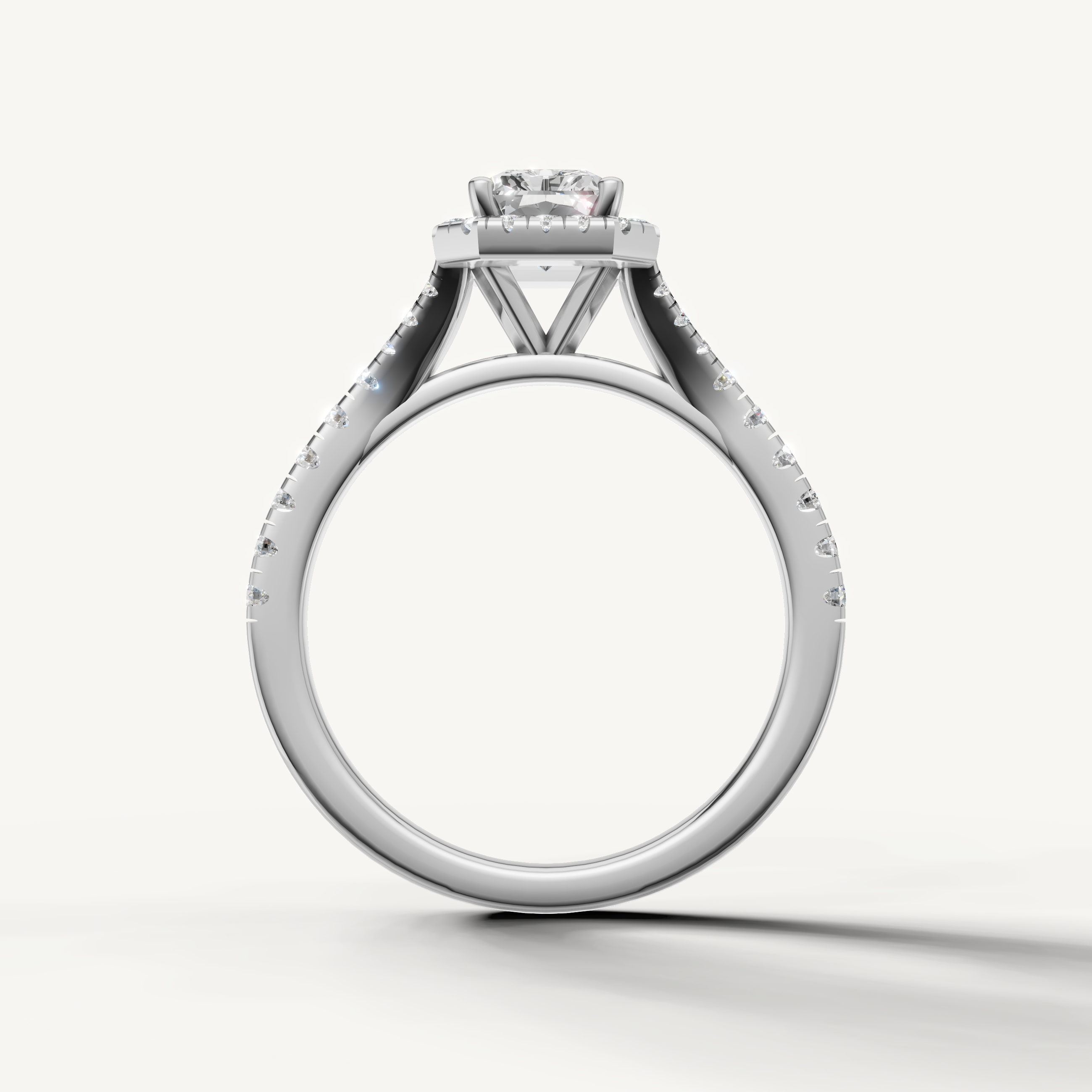 Radiant cut engagement ring with halo and pavé band white gold