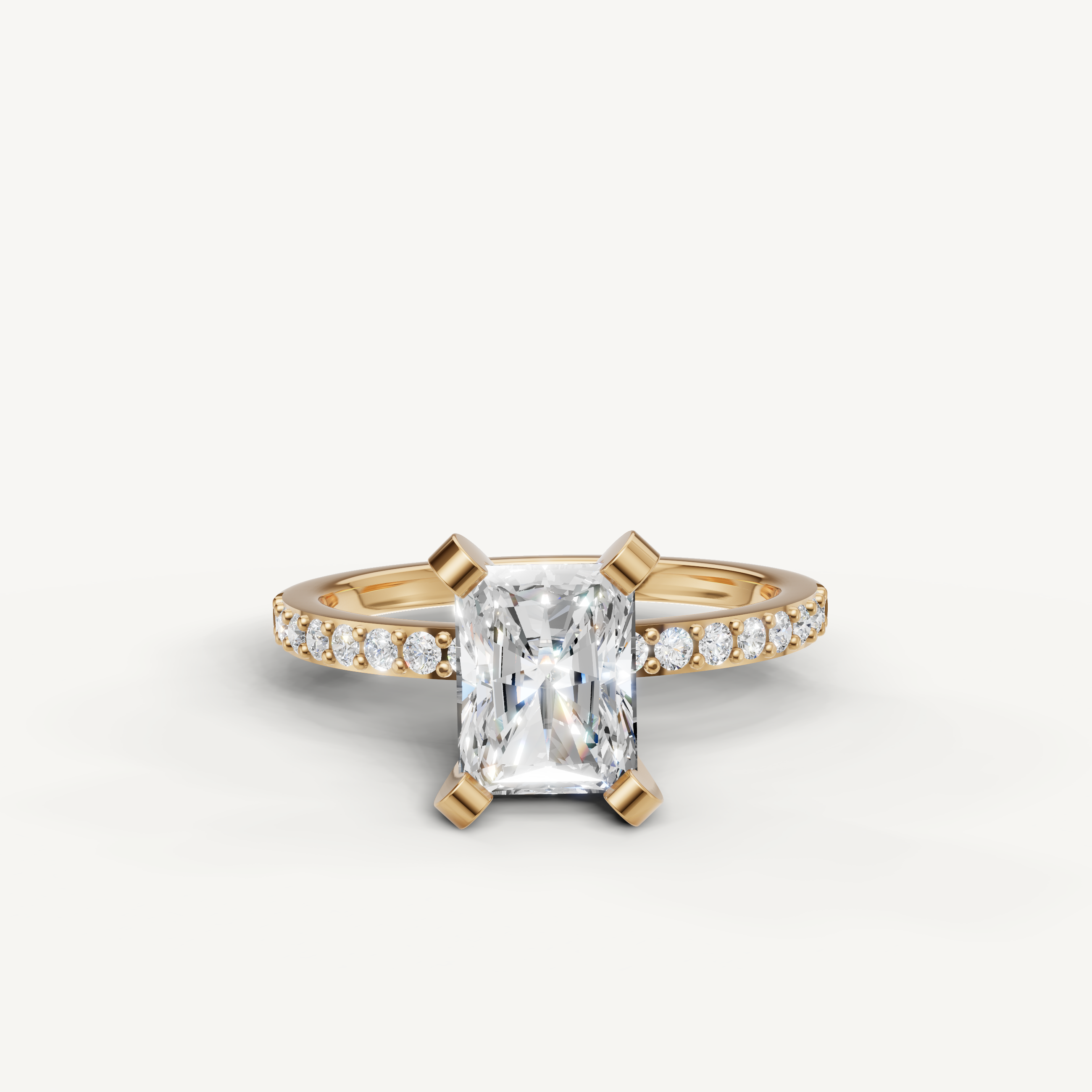 Radiant cut lab grown diamond engagement ring in 14K yellow gold pavé band
